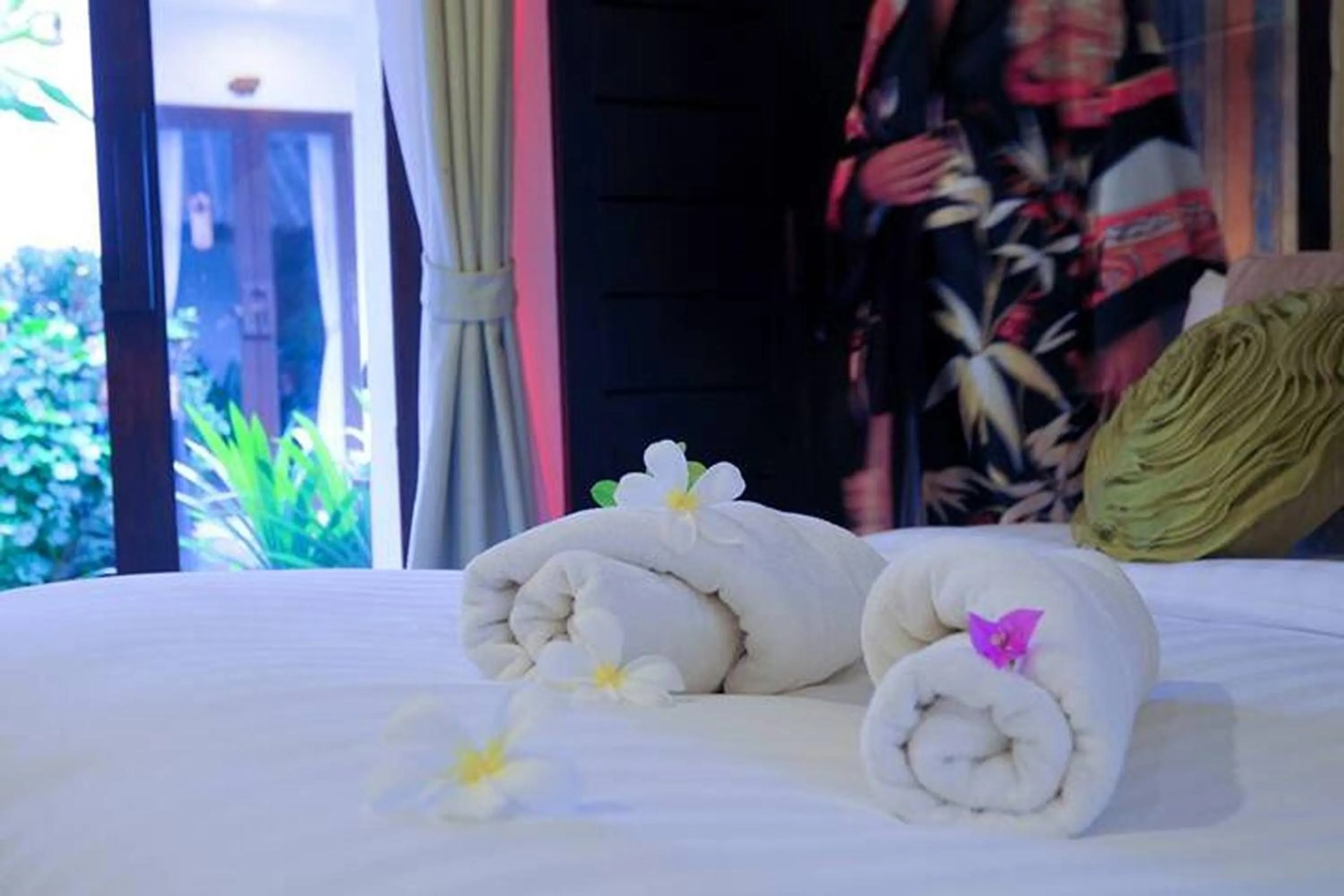 Bed in Koh Kwang Beach Resort