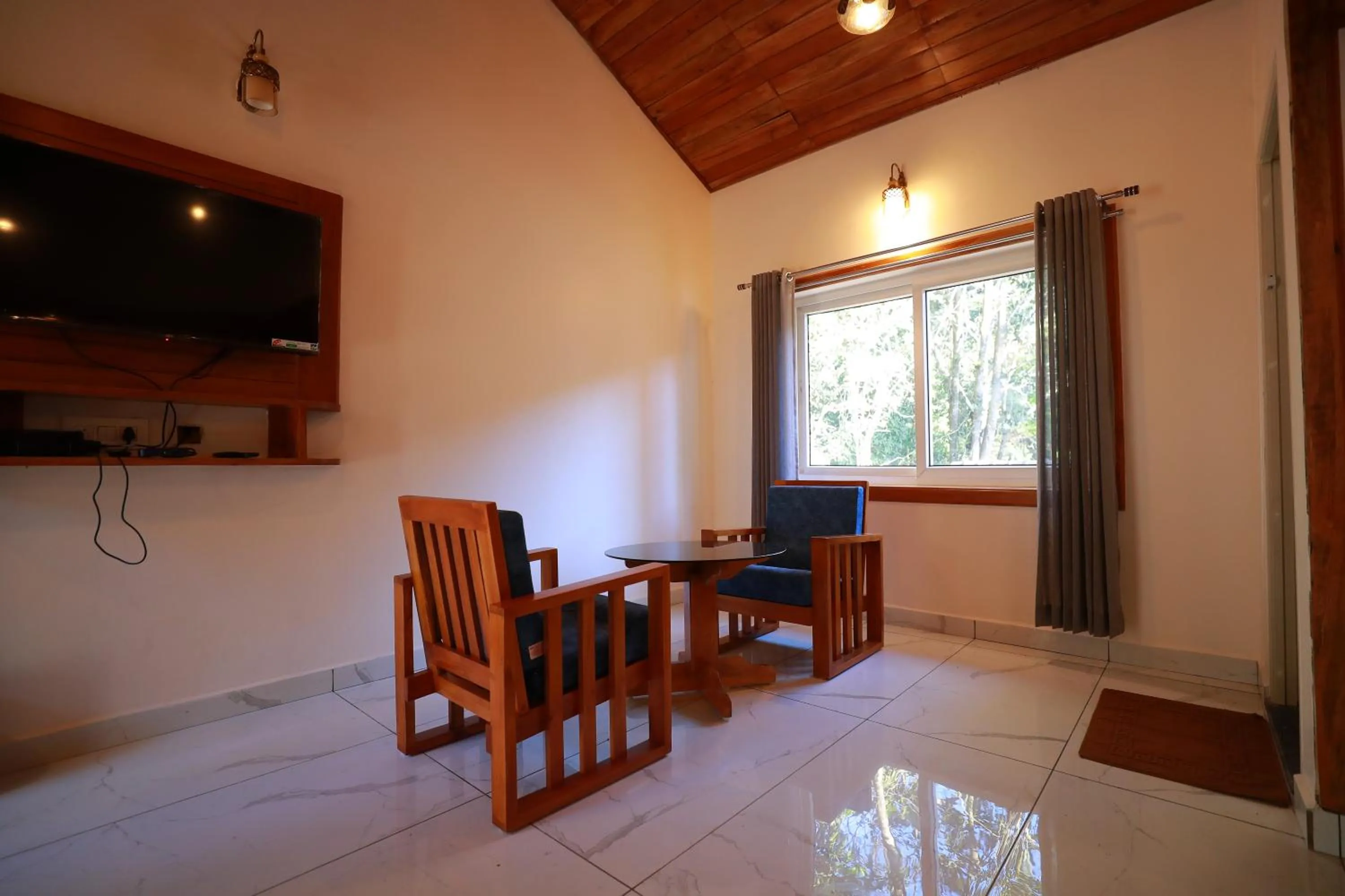 Seating area in Coorg Coffee Bean Resort Madikeri