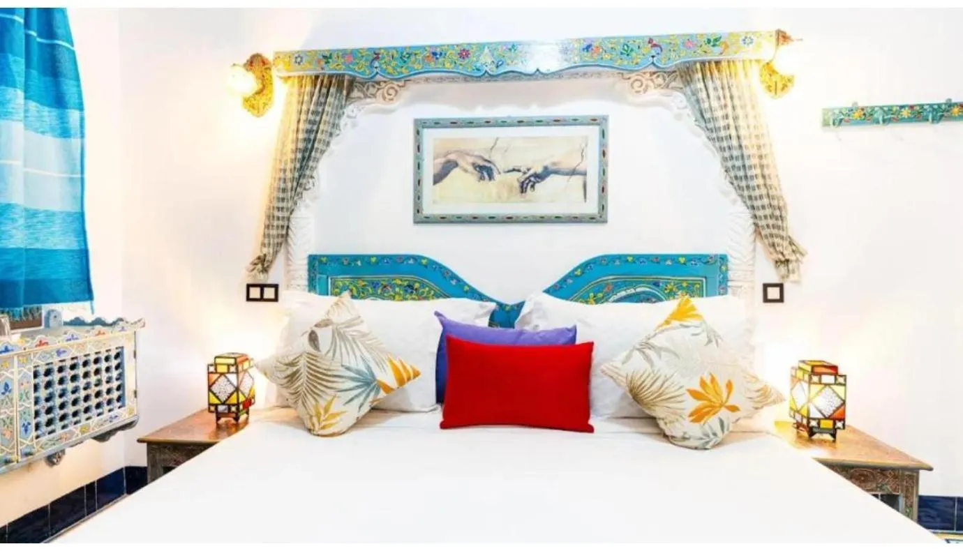 Bed in Riad 4 Jardins & Spa