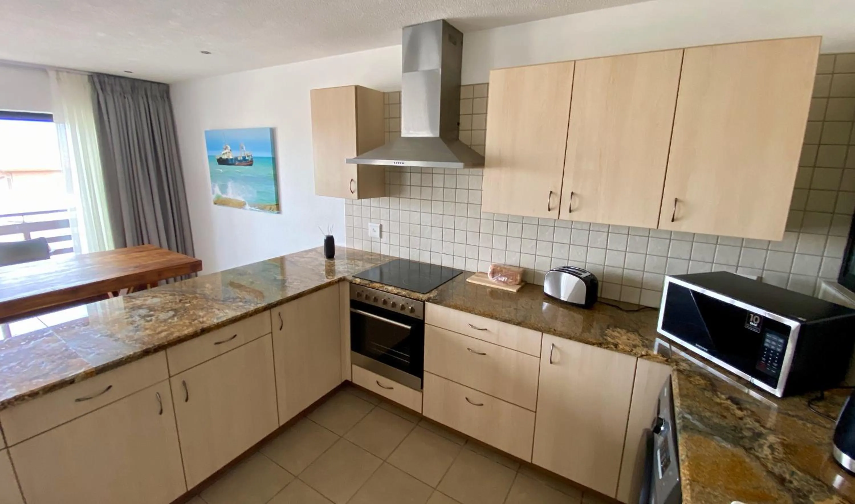 Kitchen or kitchenette in Ocean at Moringa Gardens Self Catering Accommodation