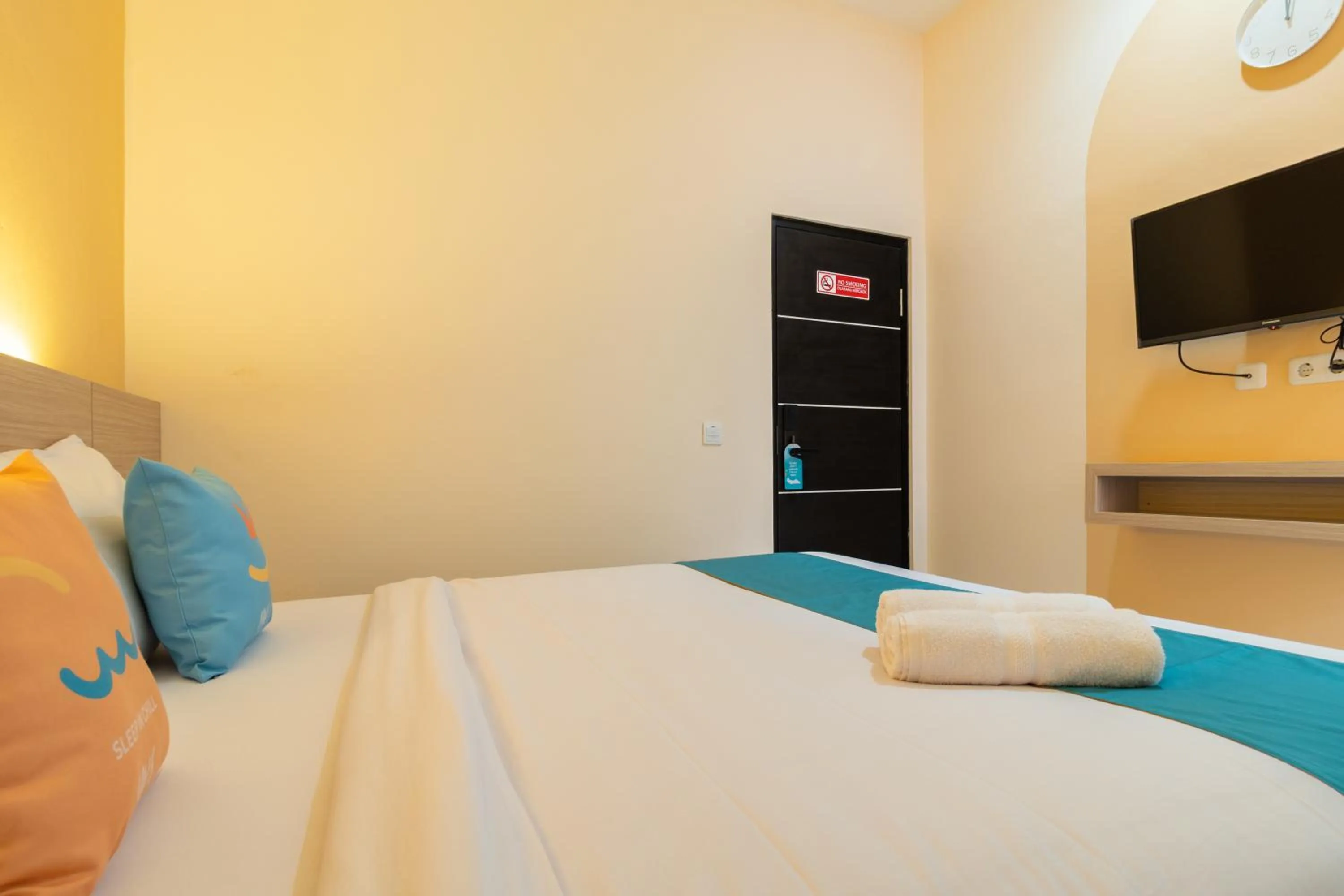 Bedroom, Bed in Sans Hotel Bubulak Bogor