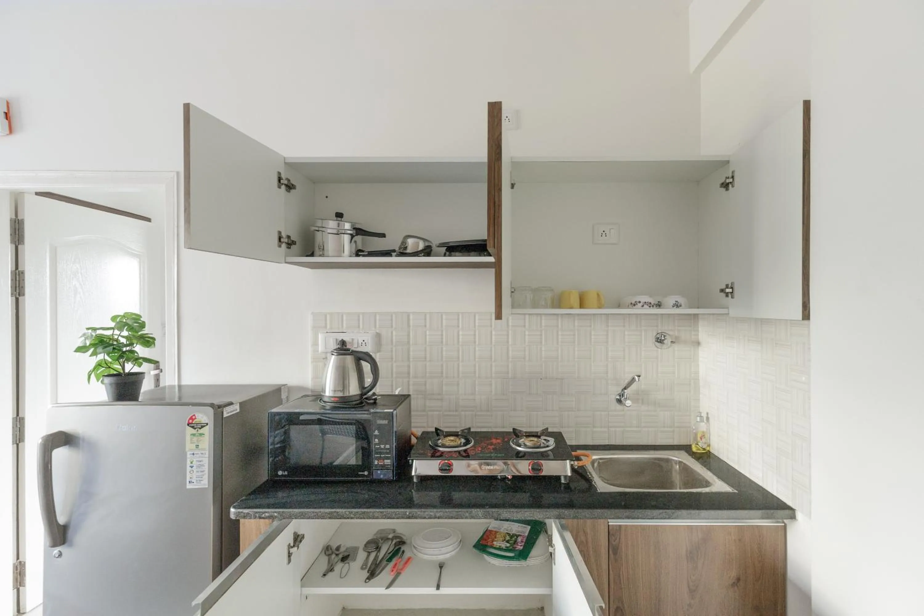 Kitchen or kitchenette in Sunrise Service Apartments