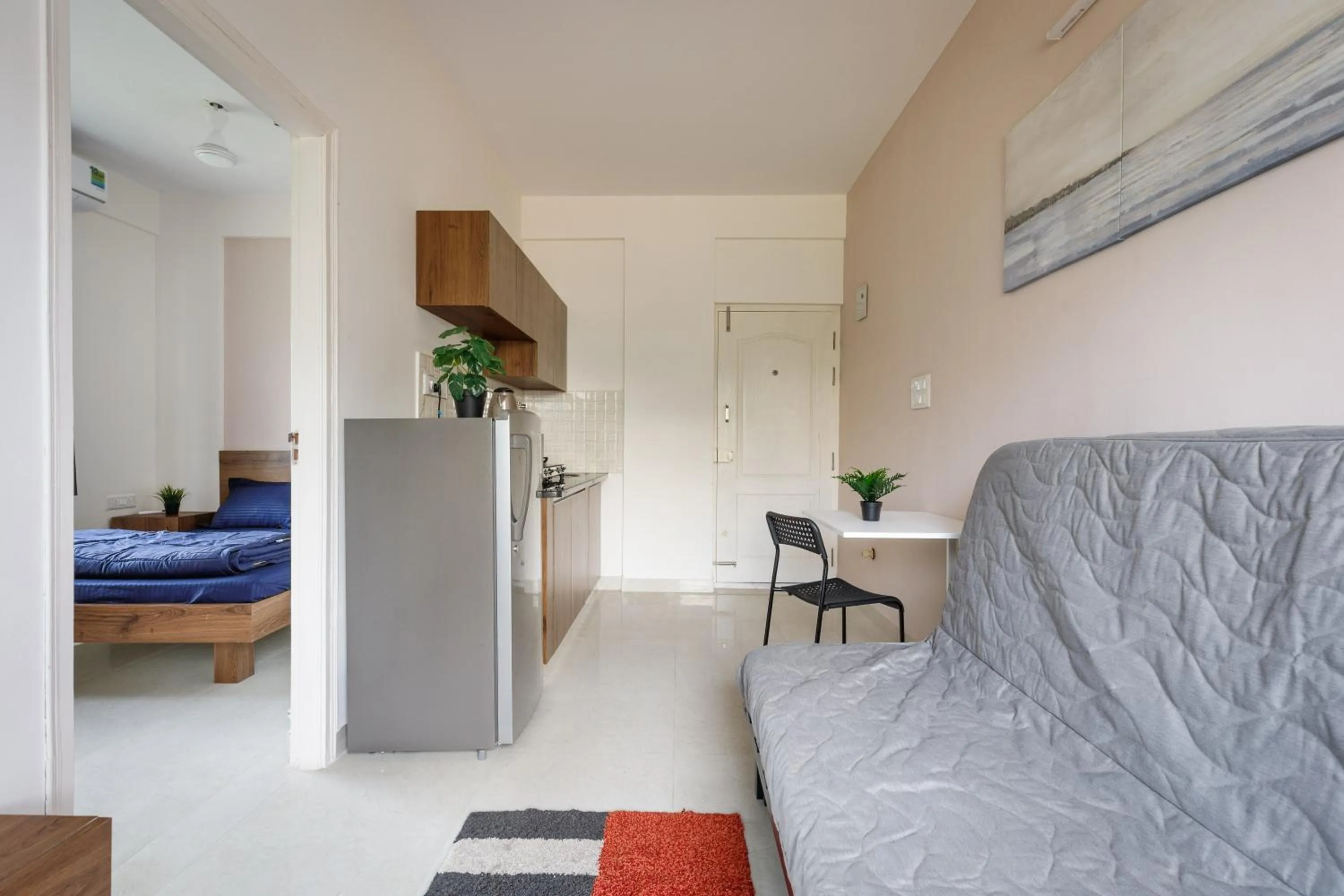 Bed in Sunrise Service Apartments