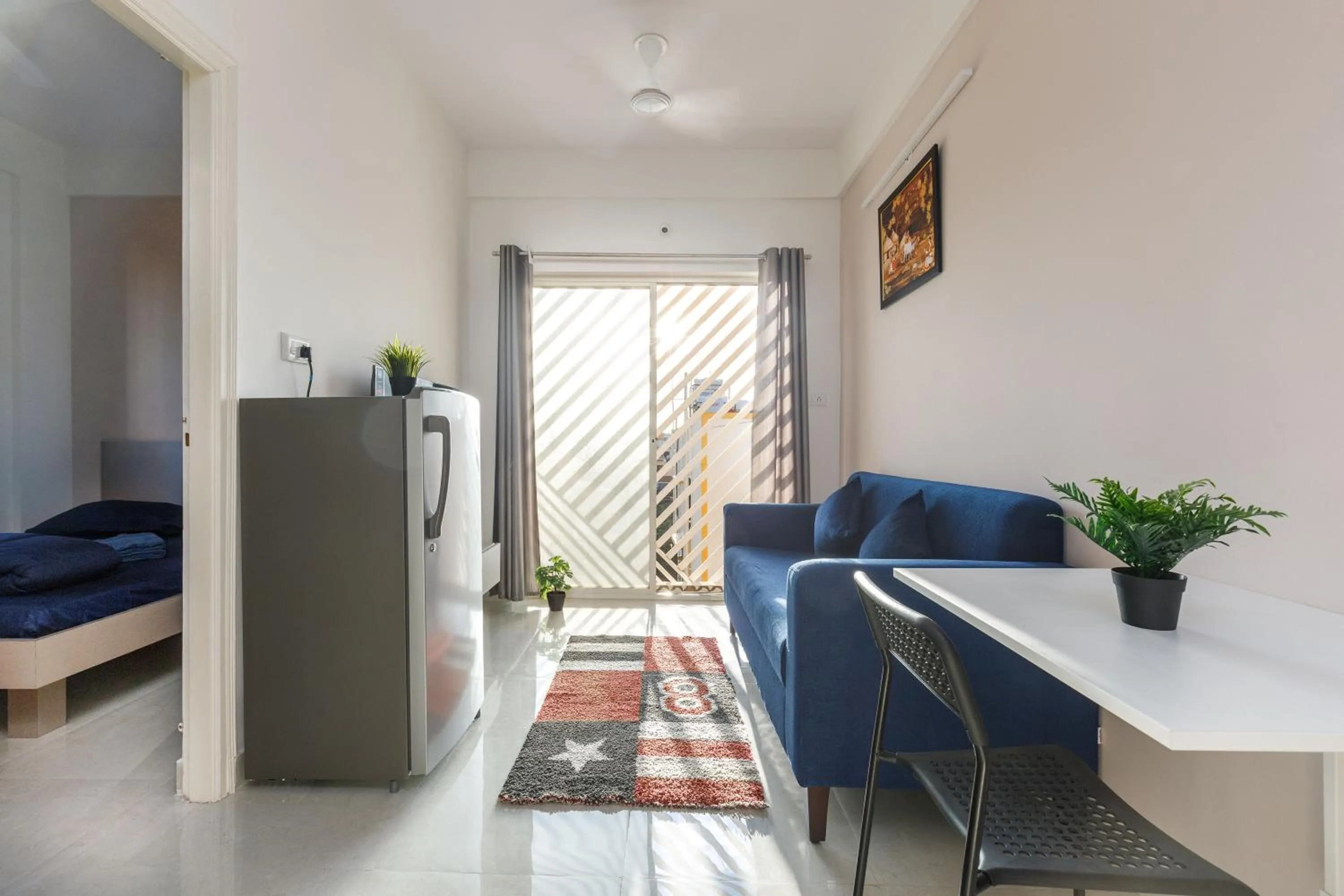 Bed in Sunrise Service Apartments