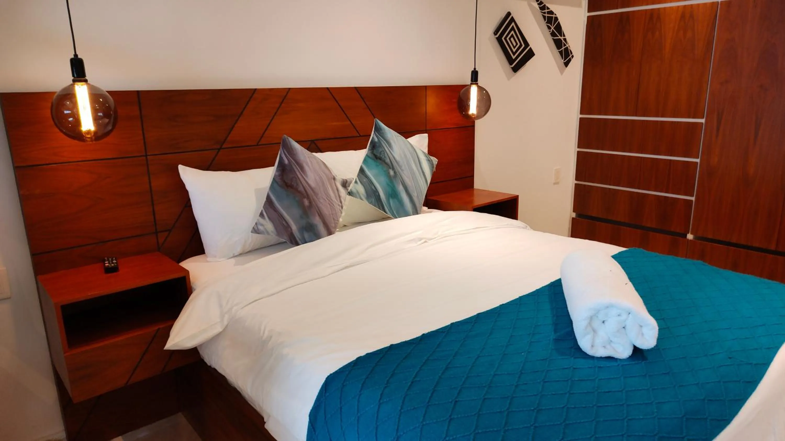 Bed in Emiliano 42 Condos Boutique