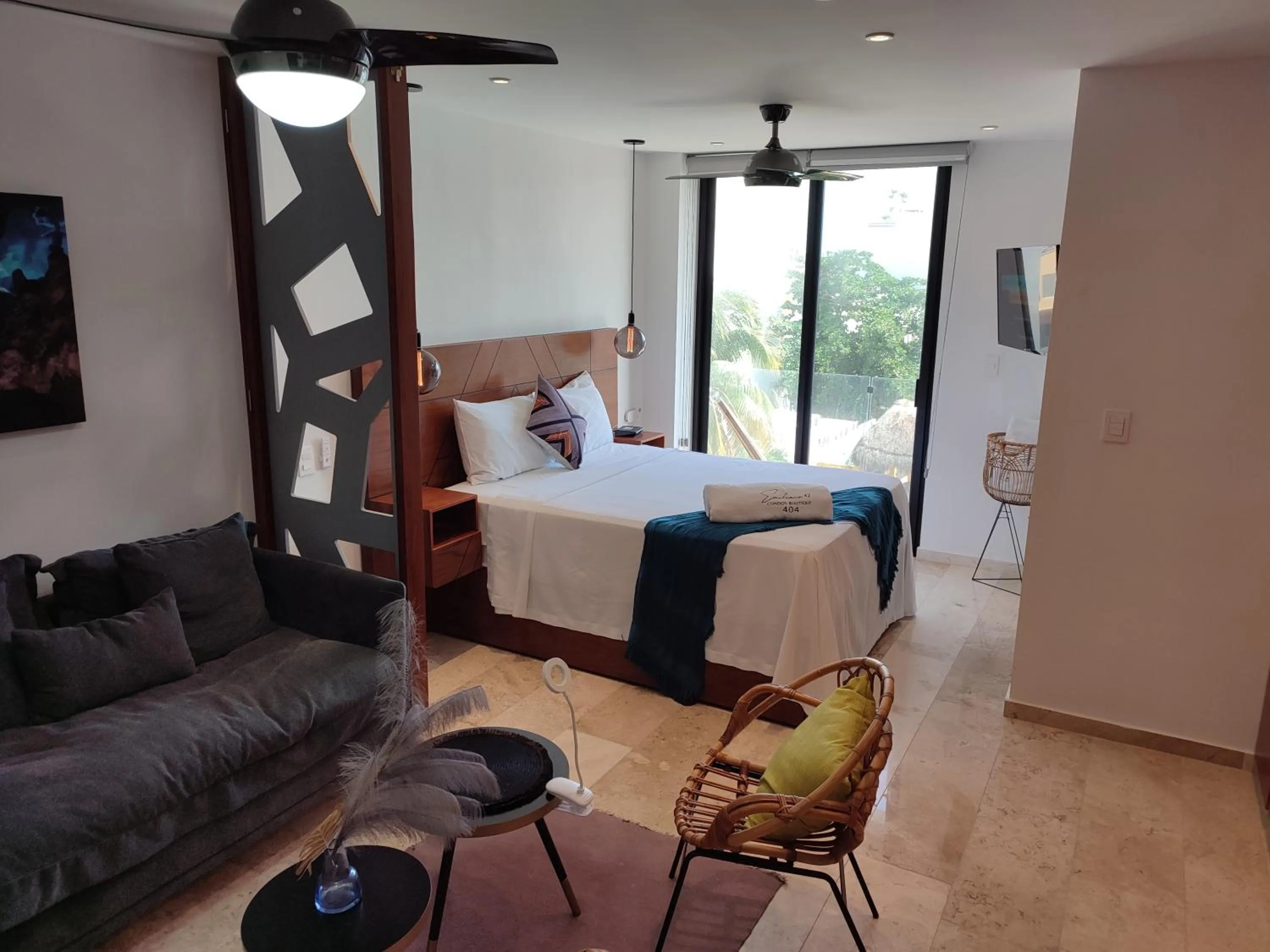 Communal lounge/ TV room in Emiliano 42 Condos Boutique