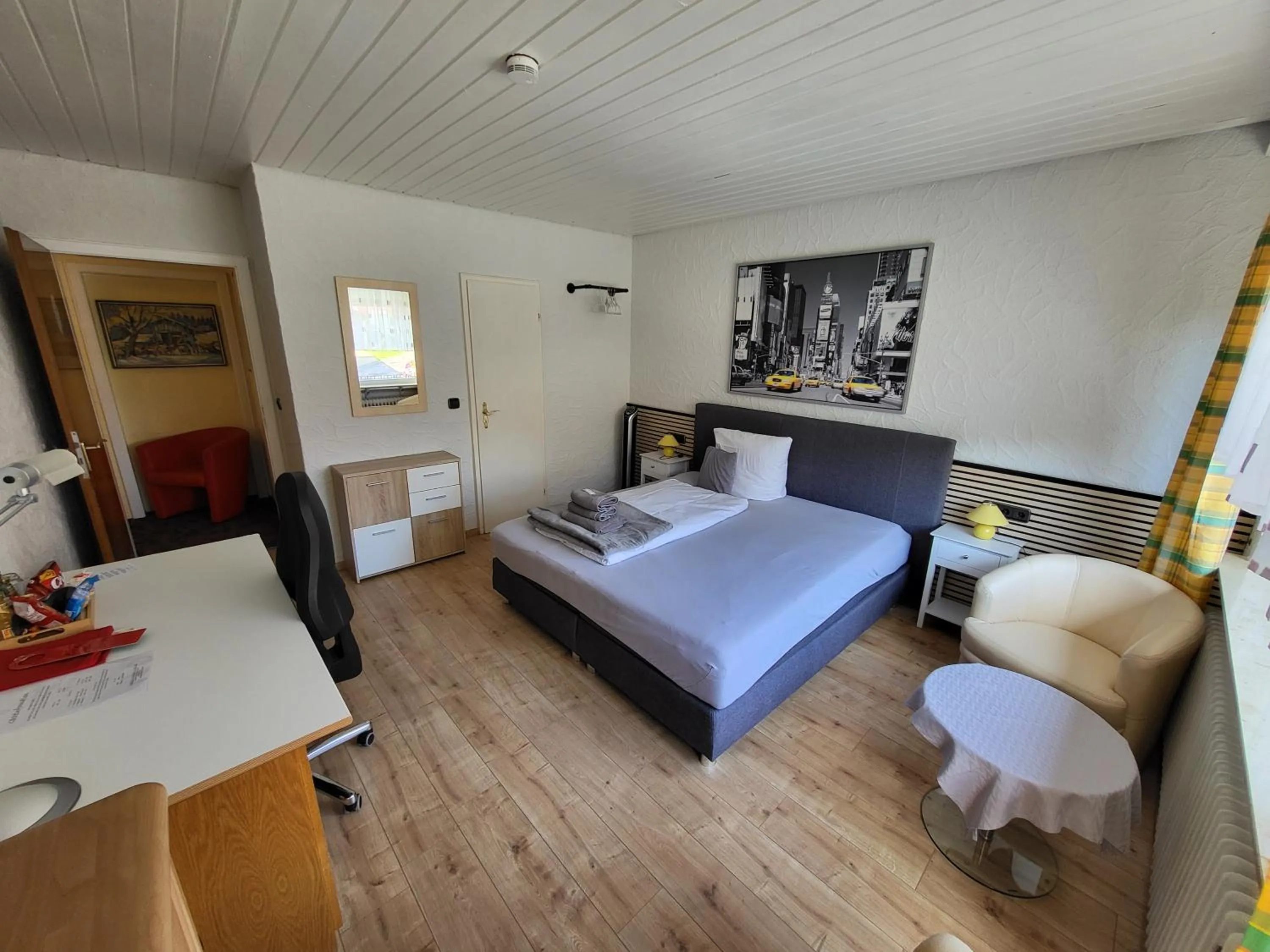 Seating area, Bed in Hotel Schönblick