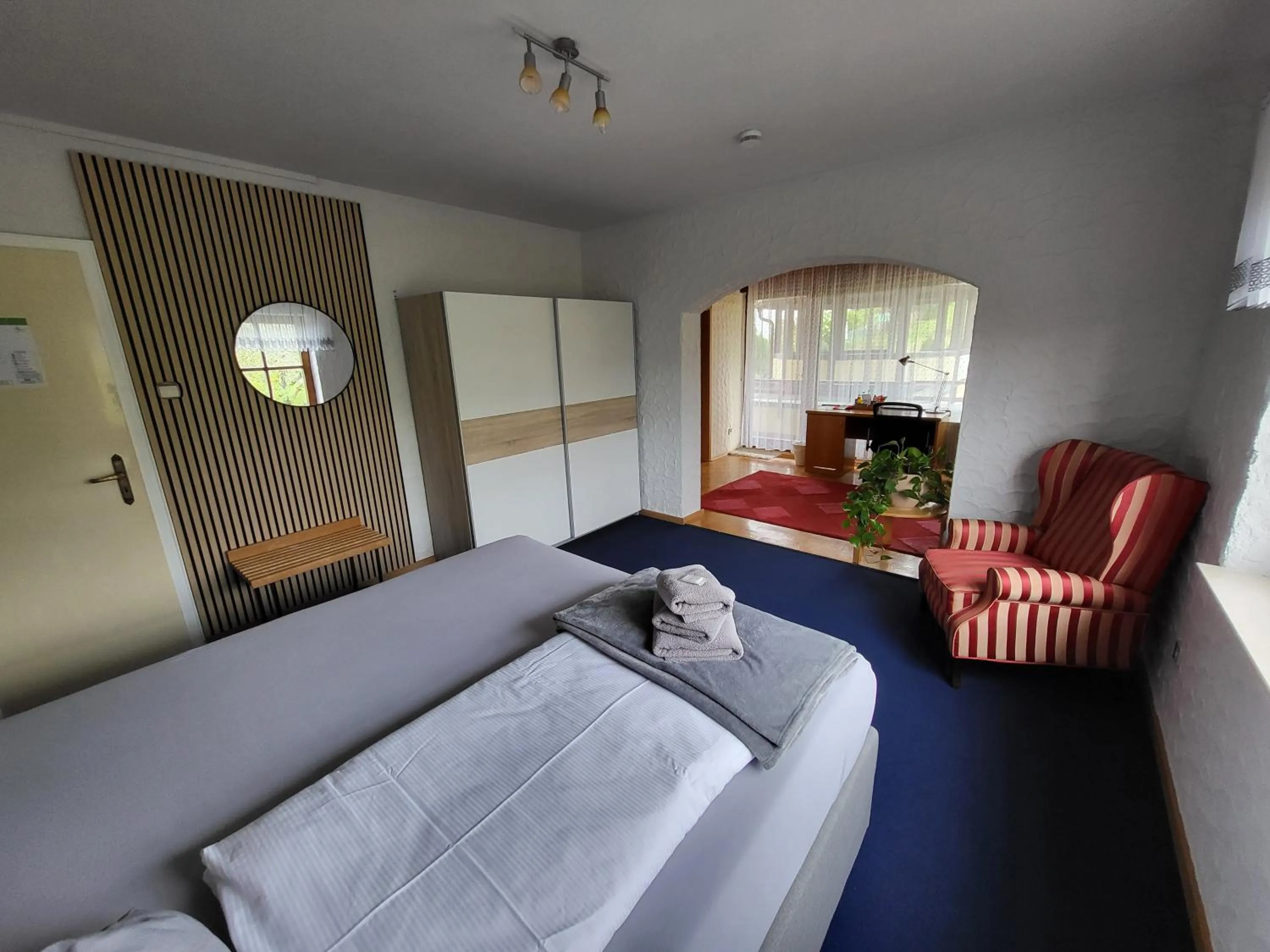 Seating area, Bed in Hotel Schönblick