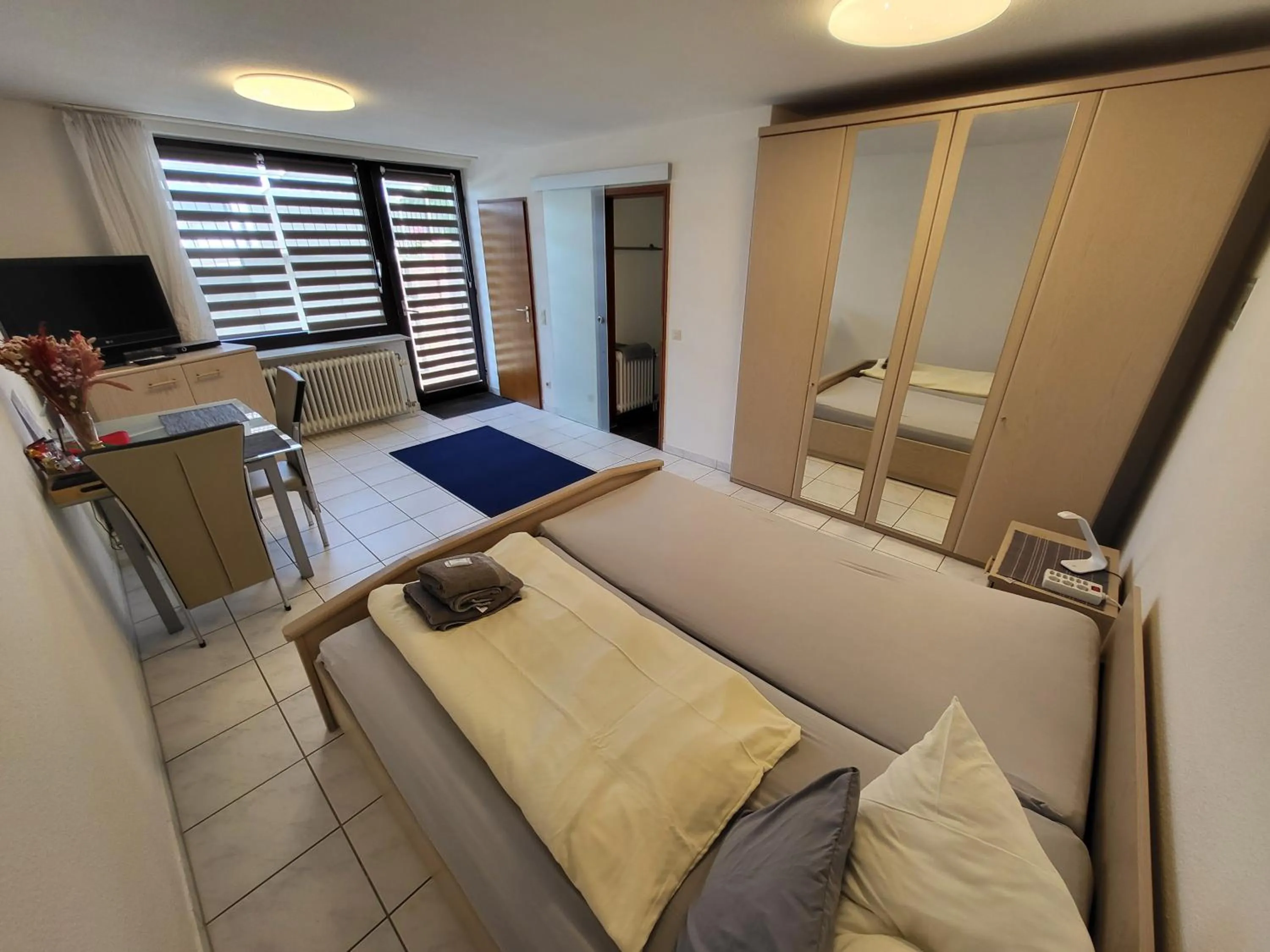 Seating area, Bed in Hotel Schönblick