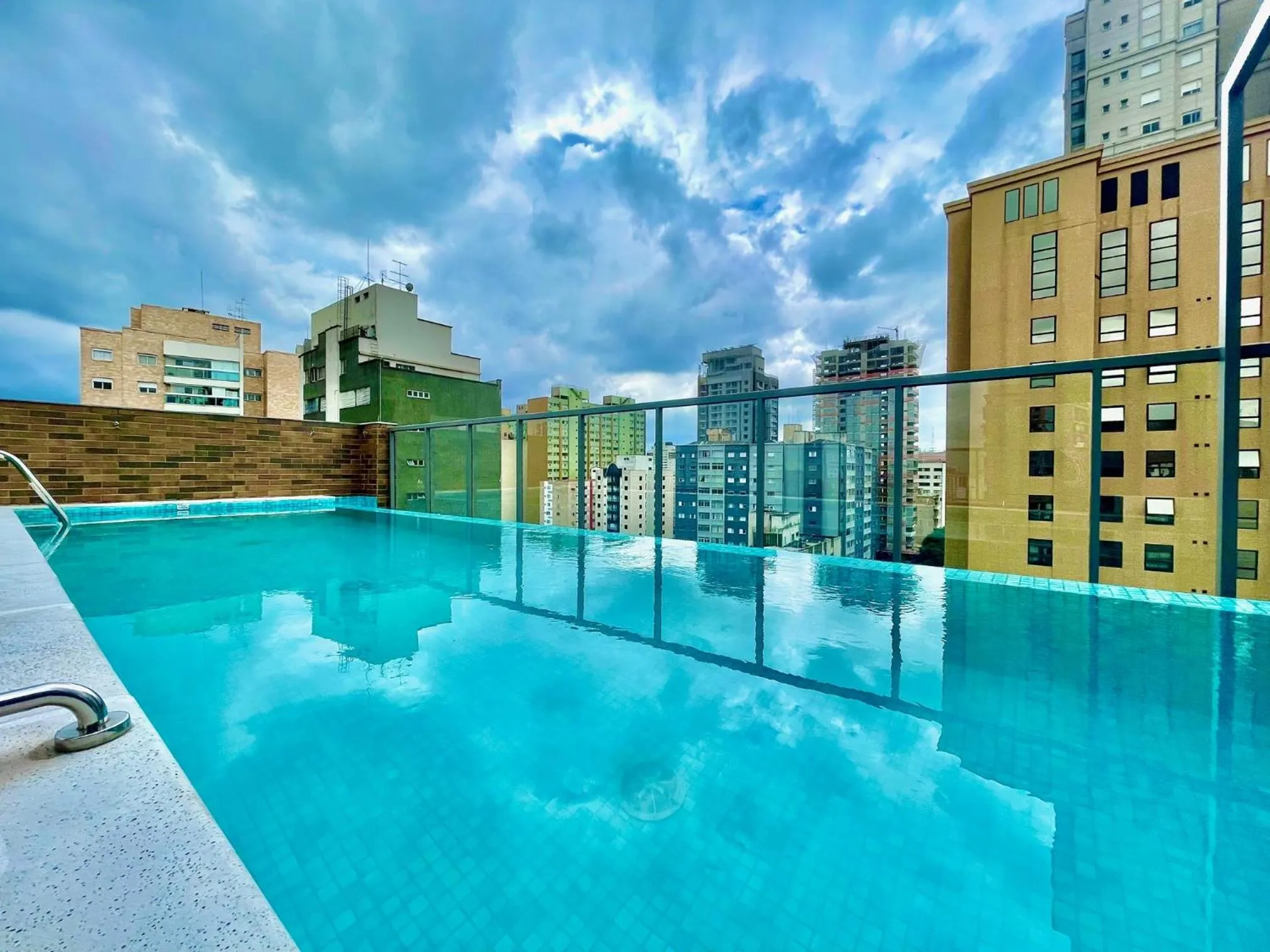 Pool view in Cozzy Suites Paraíso Hotel