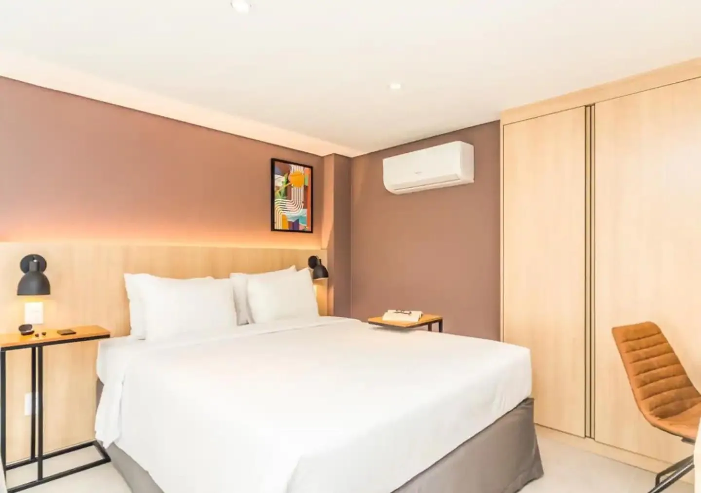 Bed in Cozzy Suites Paraíso Hotel