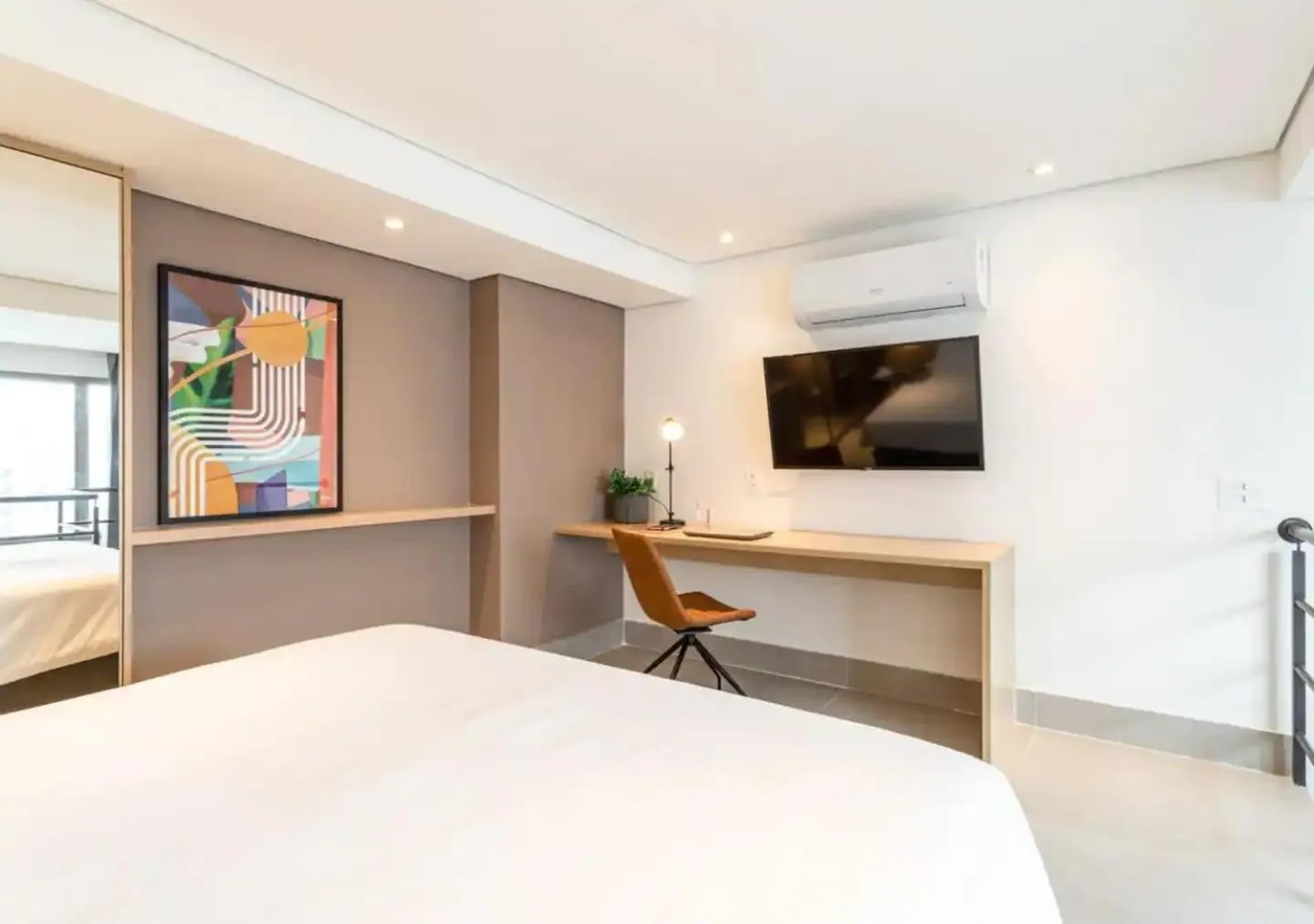 Bed in Cozzy Suites Paraíso Hotel