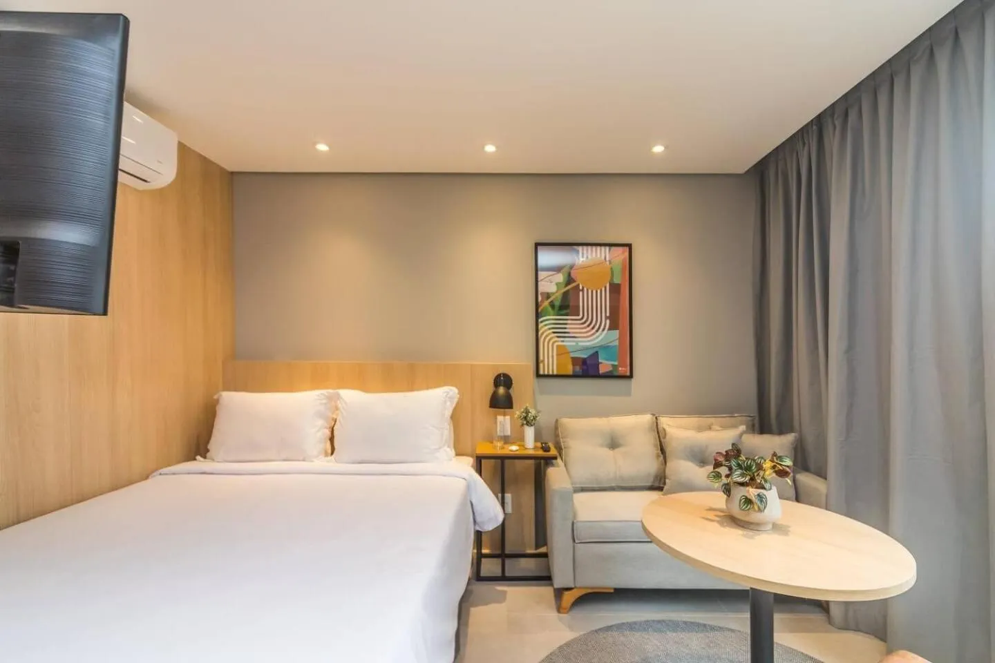 Bed in Cozzy Suites Paraíso Hotel