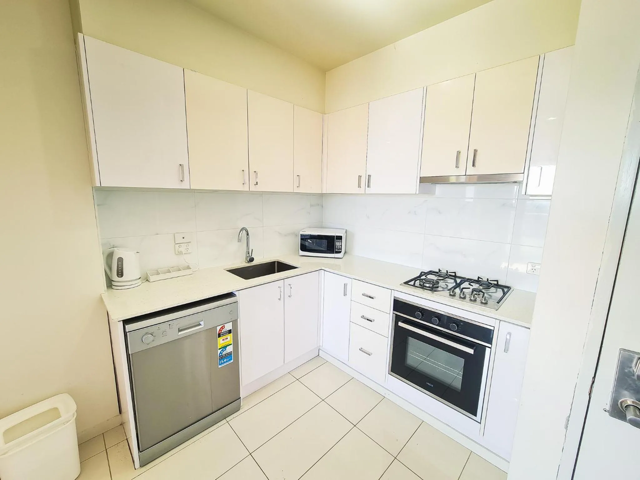 Kitchen or kitchenette in Exodus Dandenong Apartment Hotel