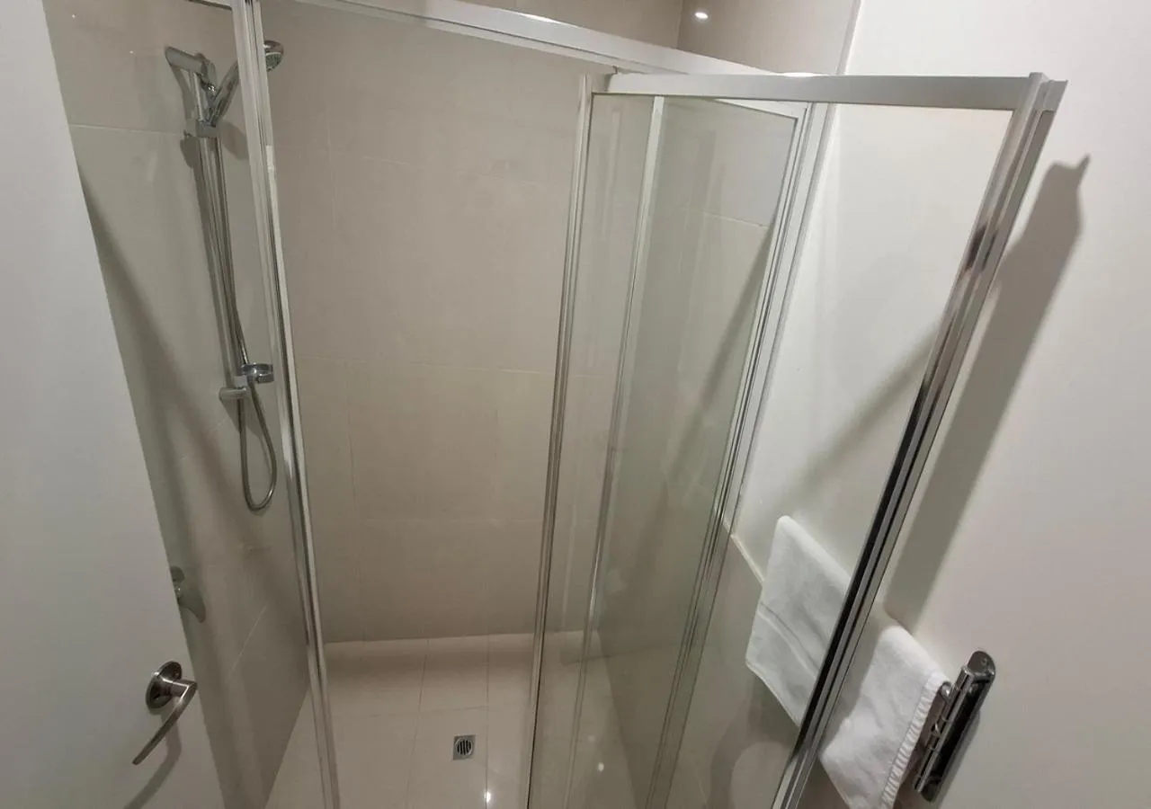 Shower in Exodus Dandenong Apartment Hotel