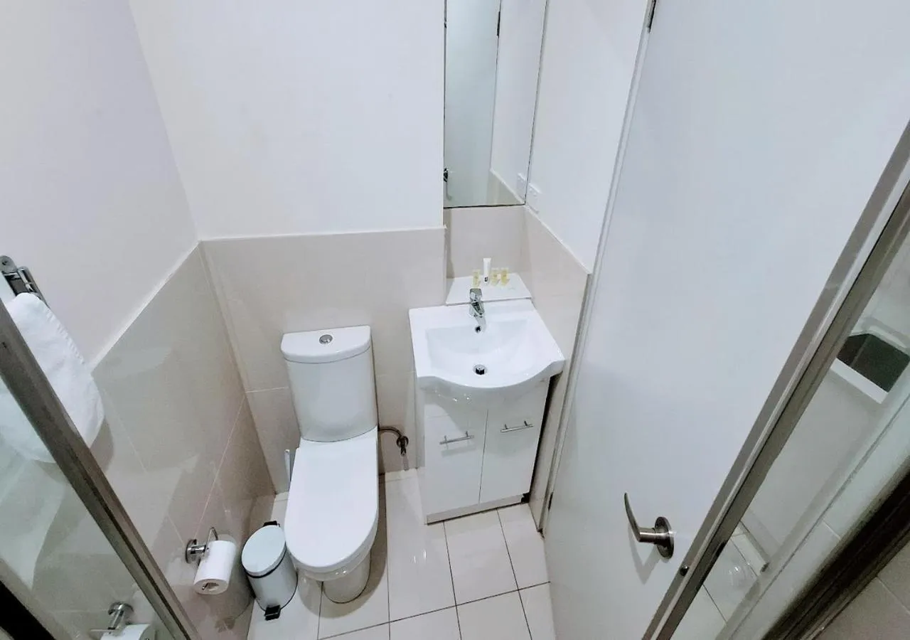 Shower in Exodus Dandenong Apartment Hotel