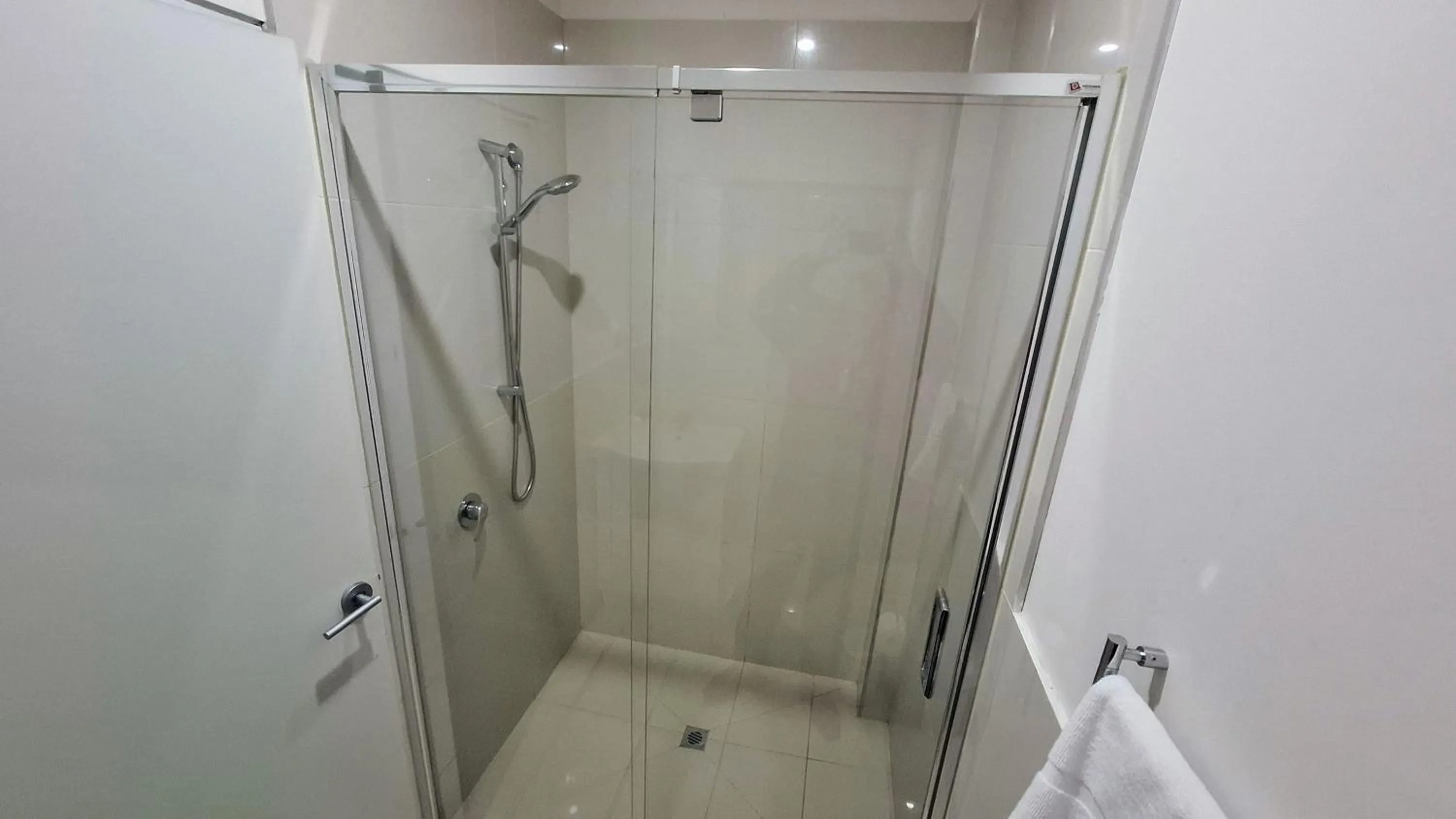Shower in Exodus Dandenong Apartment Hotel