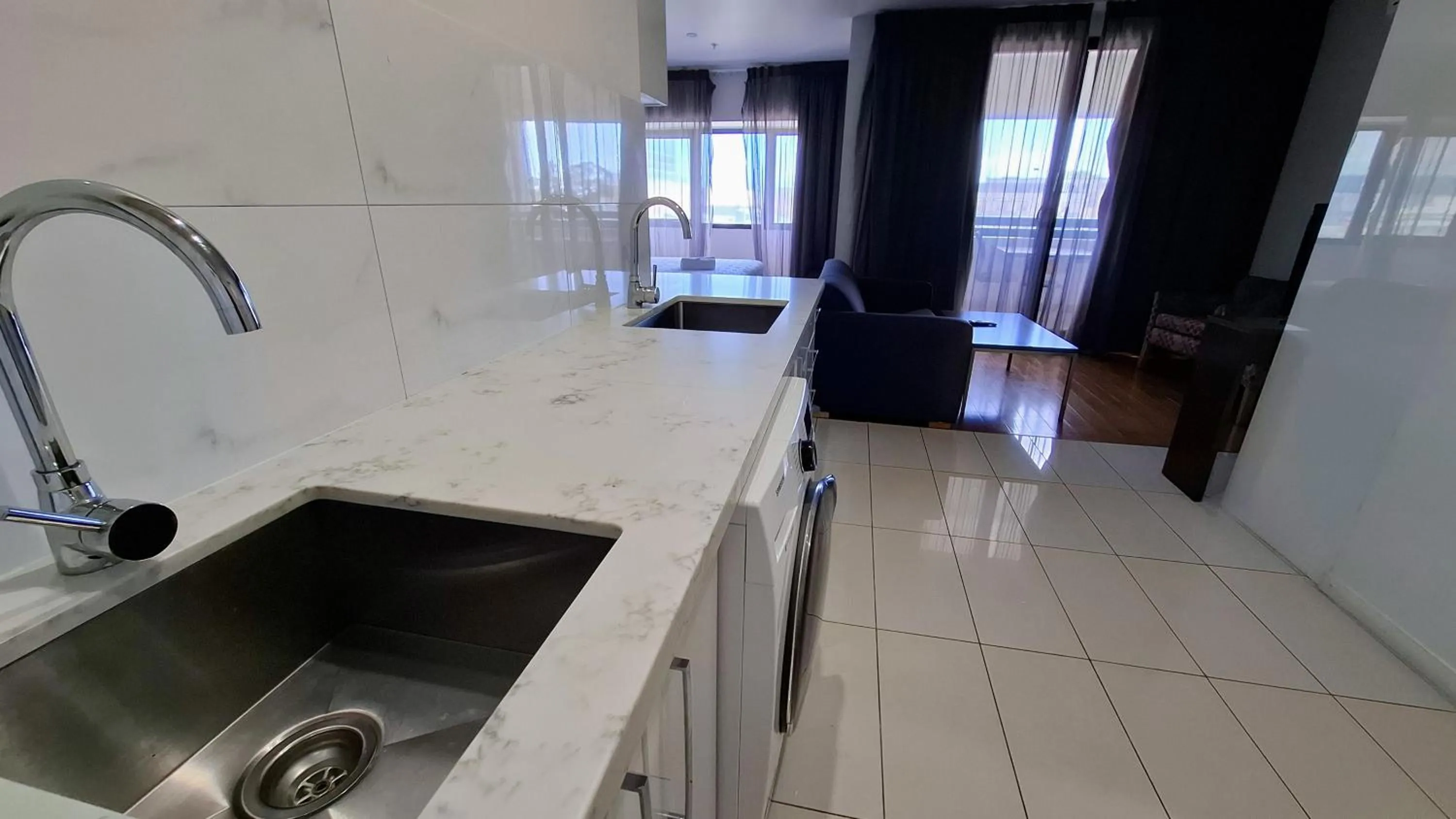 Kitchen or kitchenette in Exodus Dandenong Apartment Hotel