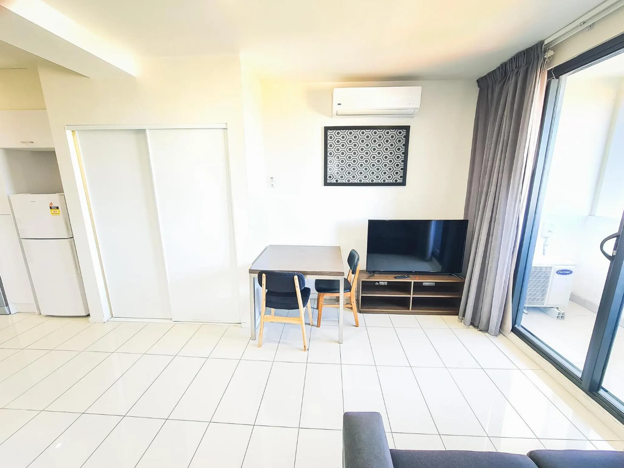 Communal lounge/ TV room in Exodus Dandenong Apartment Hotel