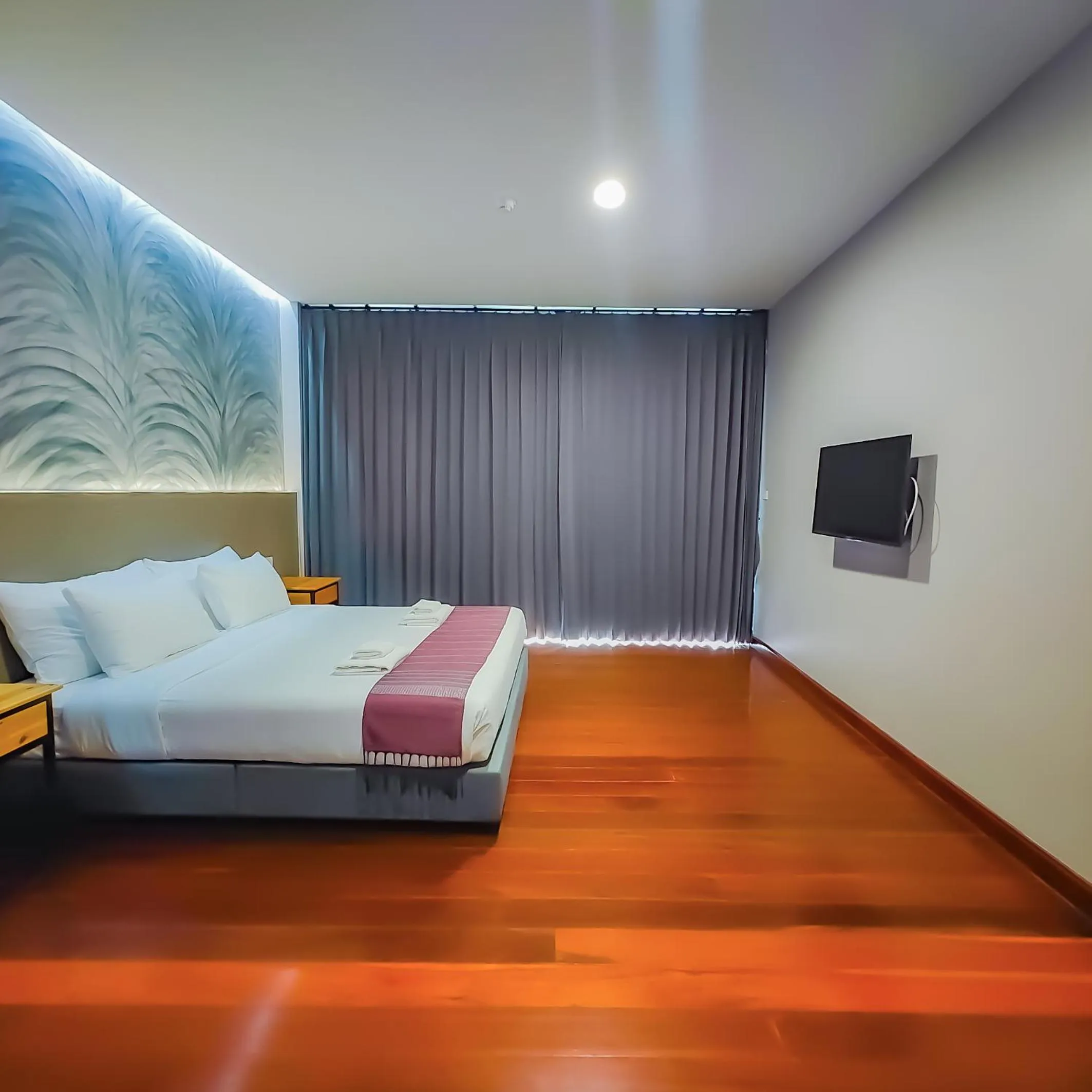 Bed in The Riva Vientiane Hotel