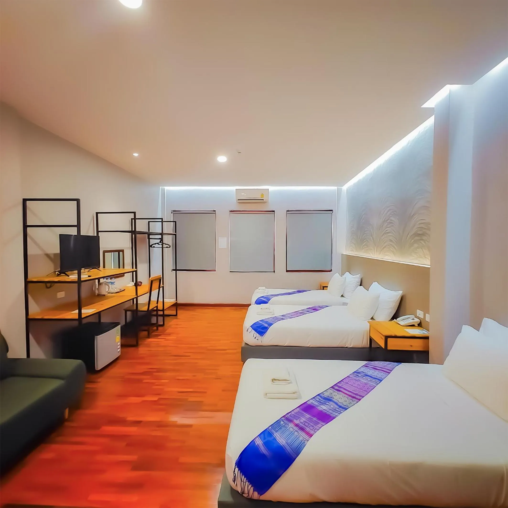 Bed in The Riva Vientiane Hotel