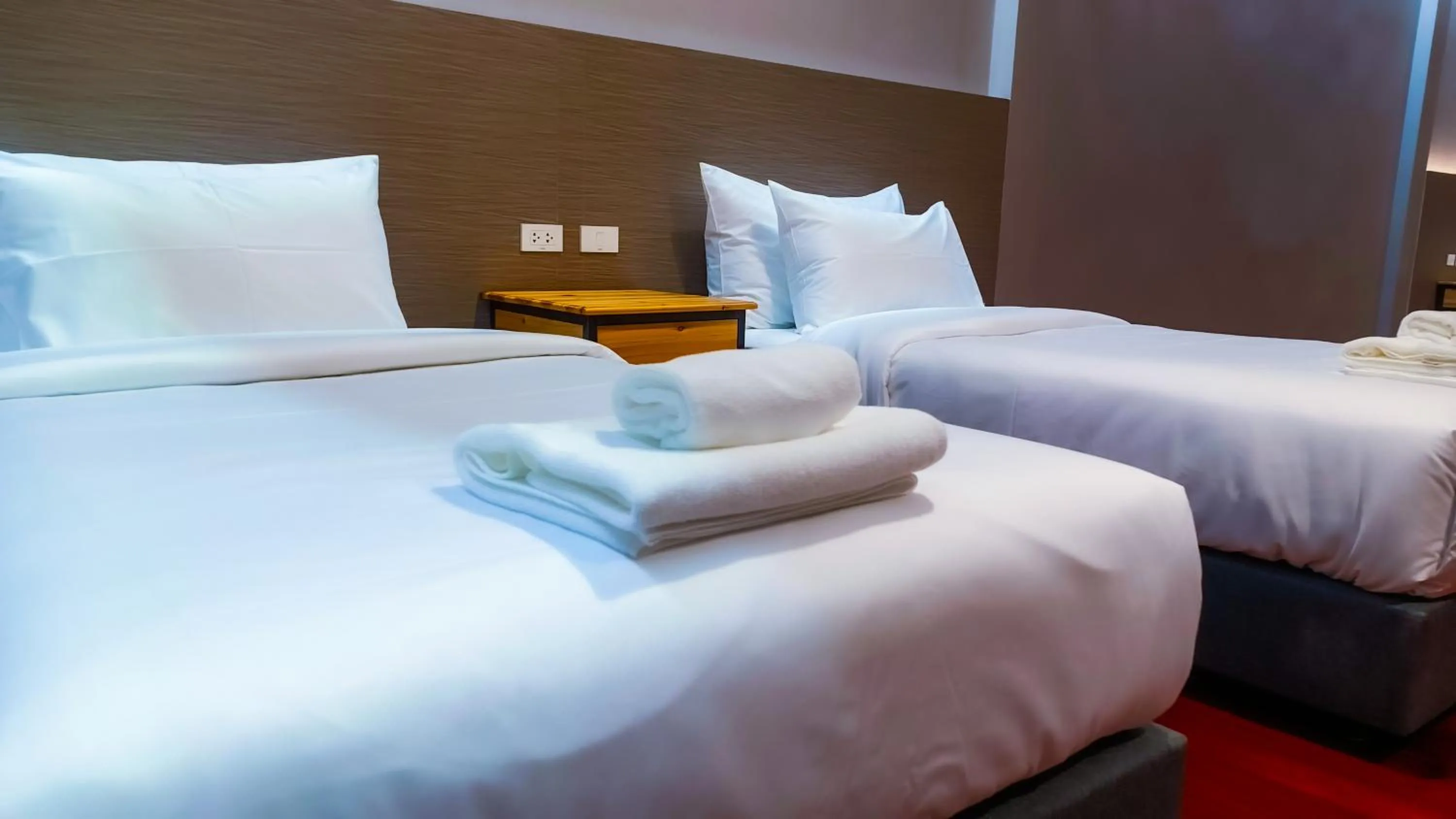 Bed in The Riva Vientiane Hotel