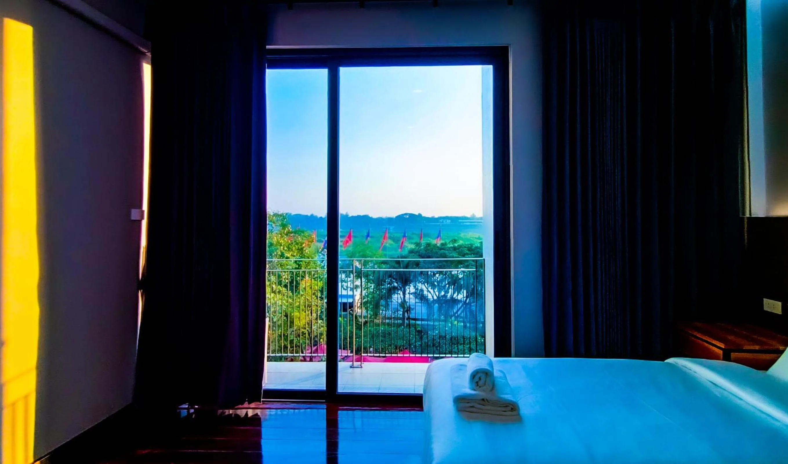 Bed in The Riva Vientiane Hotel