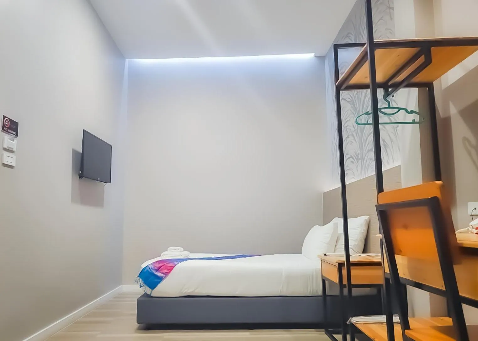 Bed in The Riva Vientiane Hotel