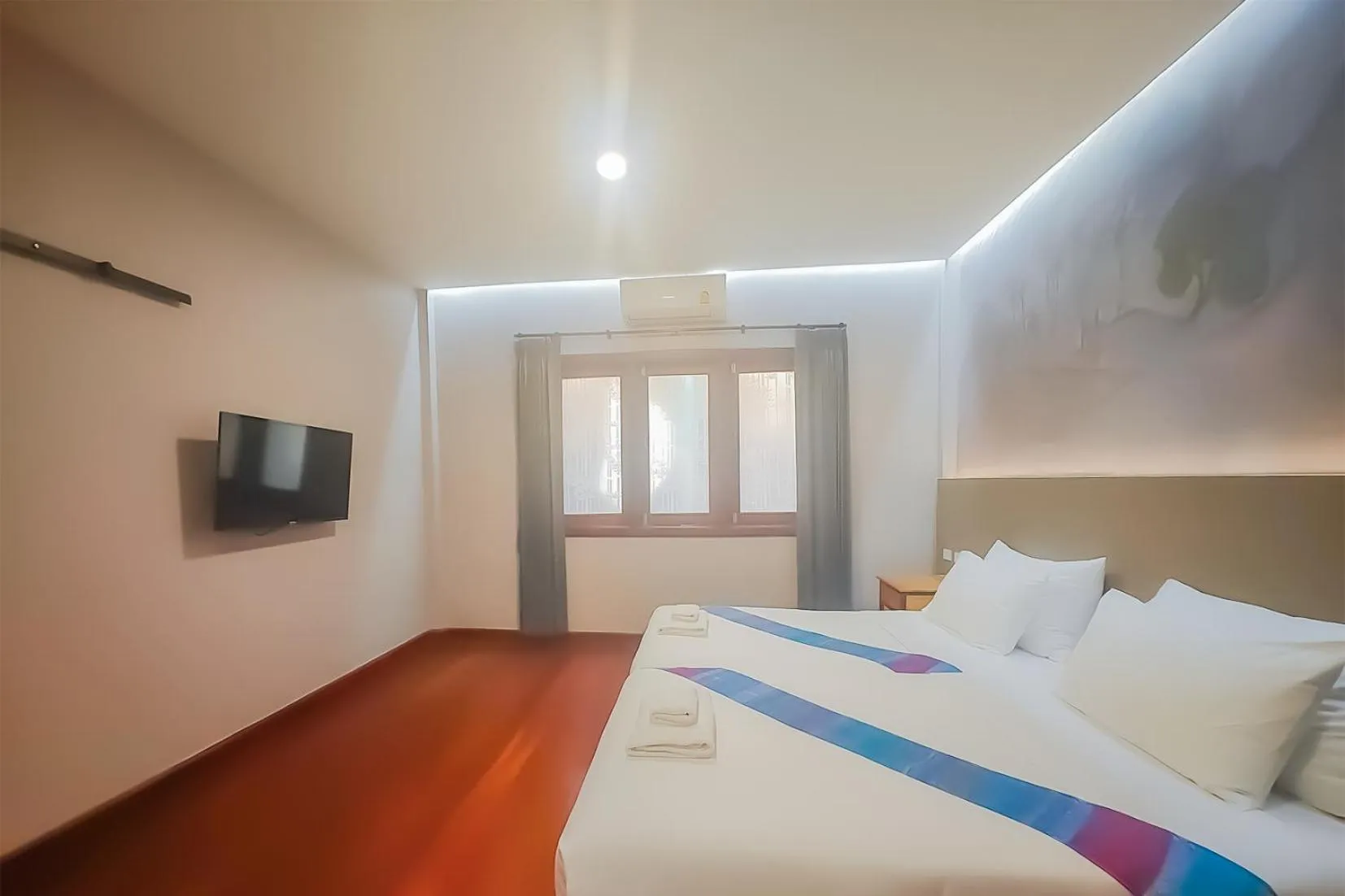 Bed in The Riva Vientiane Hotel