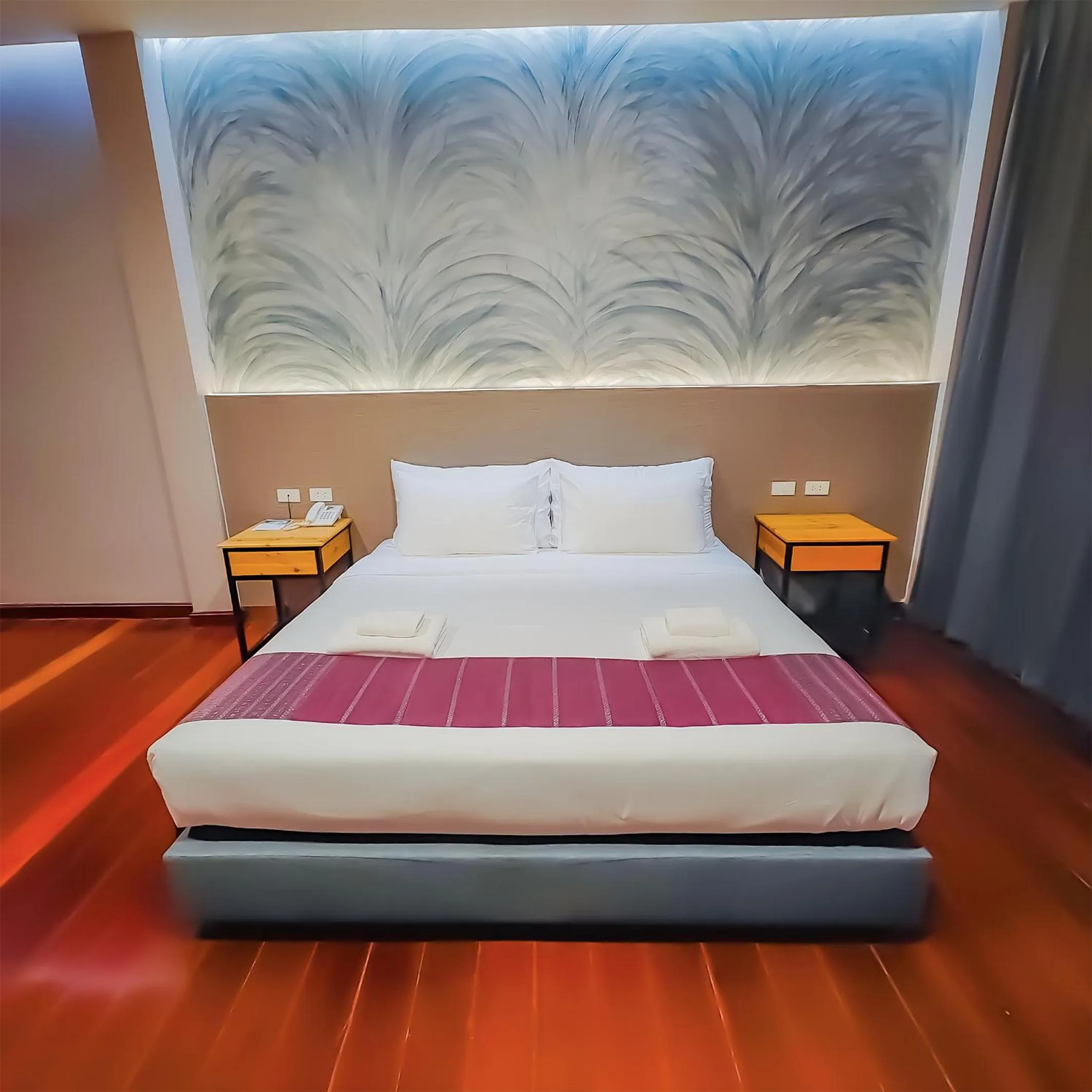Bed in The Riva Vientiane Hotel