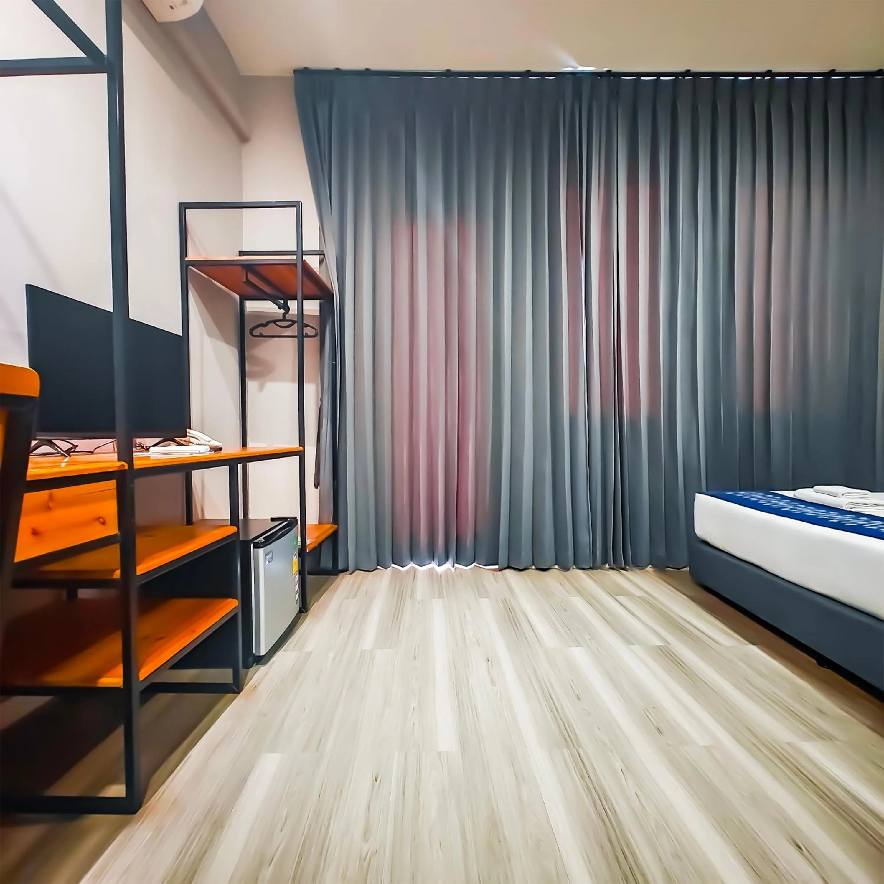 Bed in The Riva Vientiane Hotel