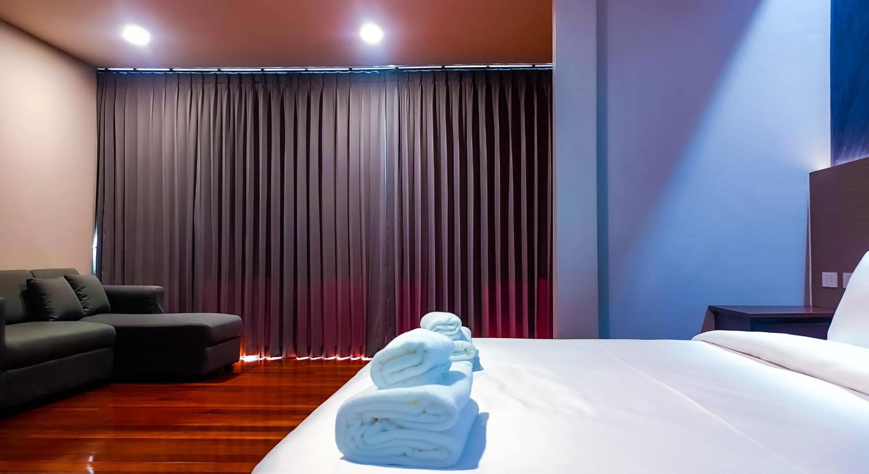 Bed in The Riva Vientiane Hotel