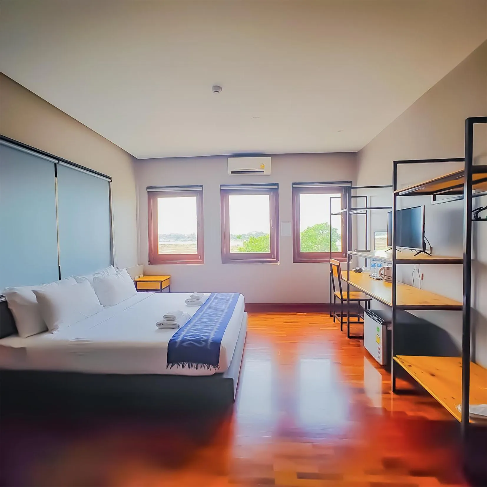 Bed in The Riva Vientiane Hotel