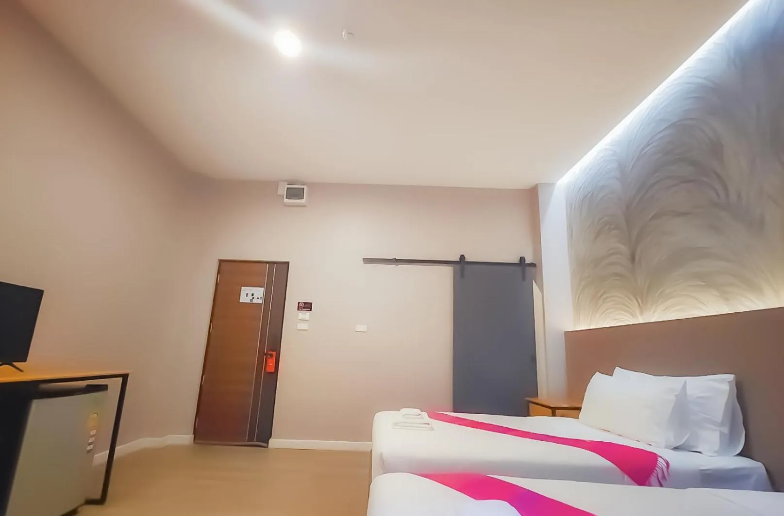 Bed in The Riva Vientiane Hotel