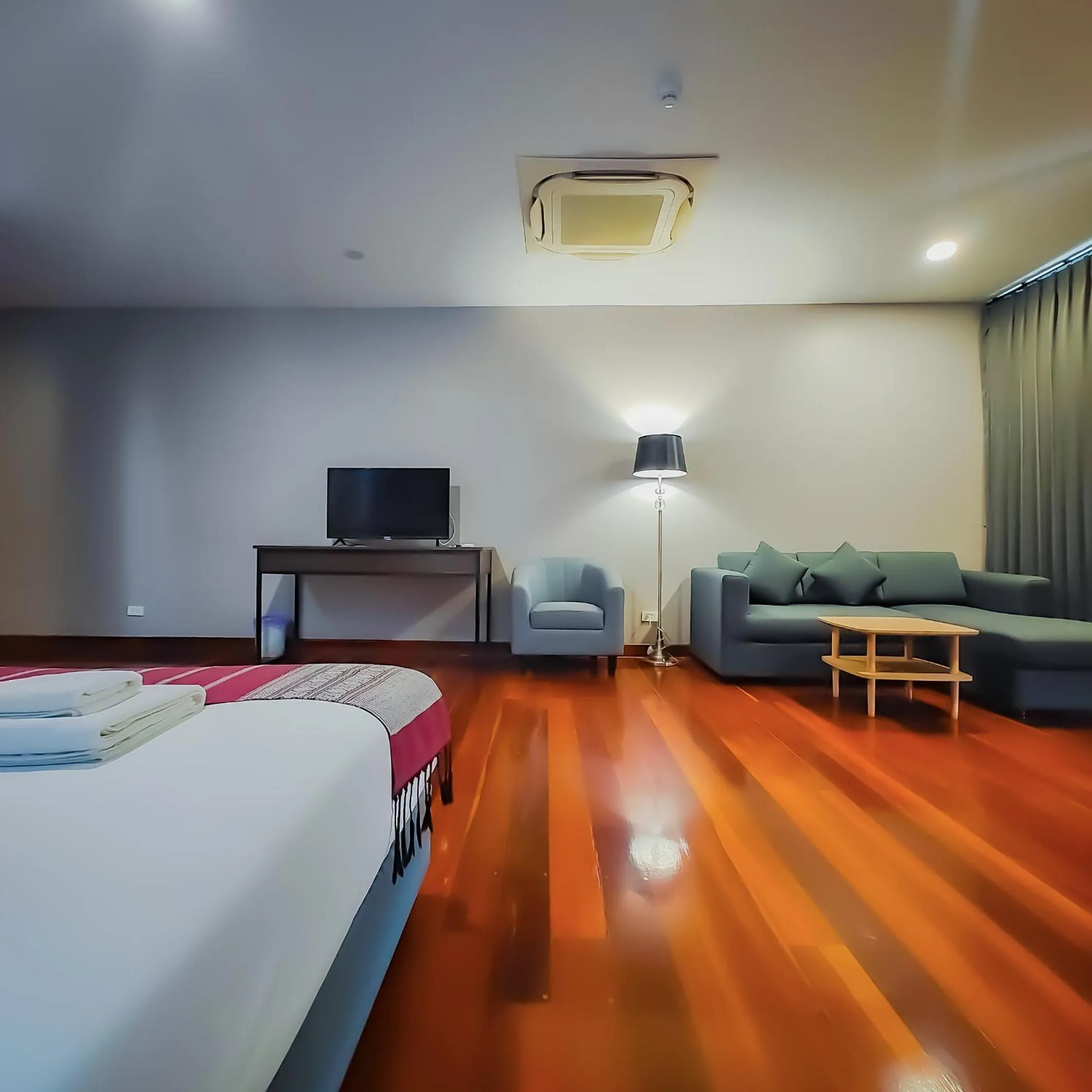 Bed in The Riva Vientiane Hotel