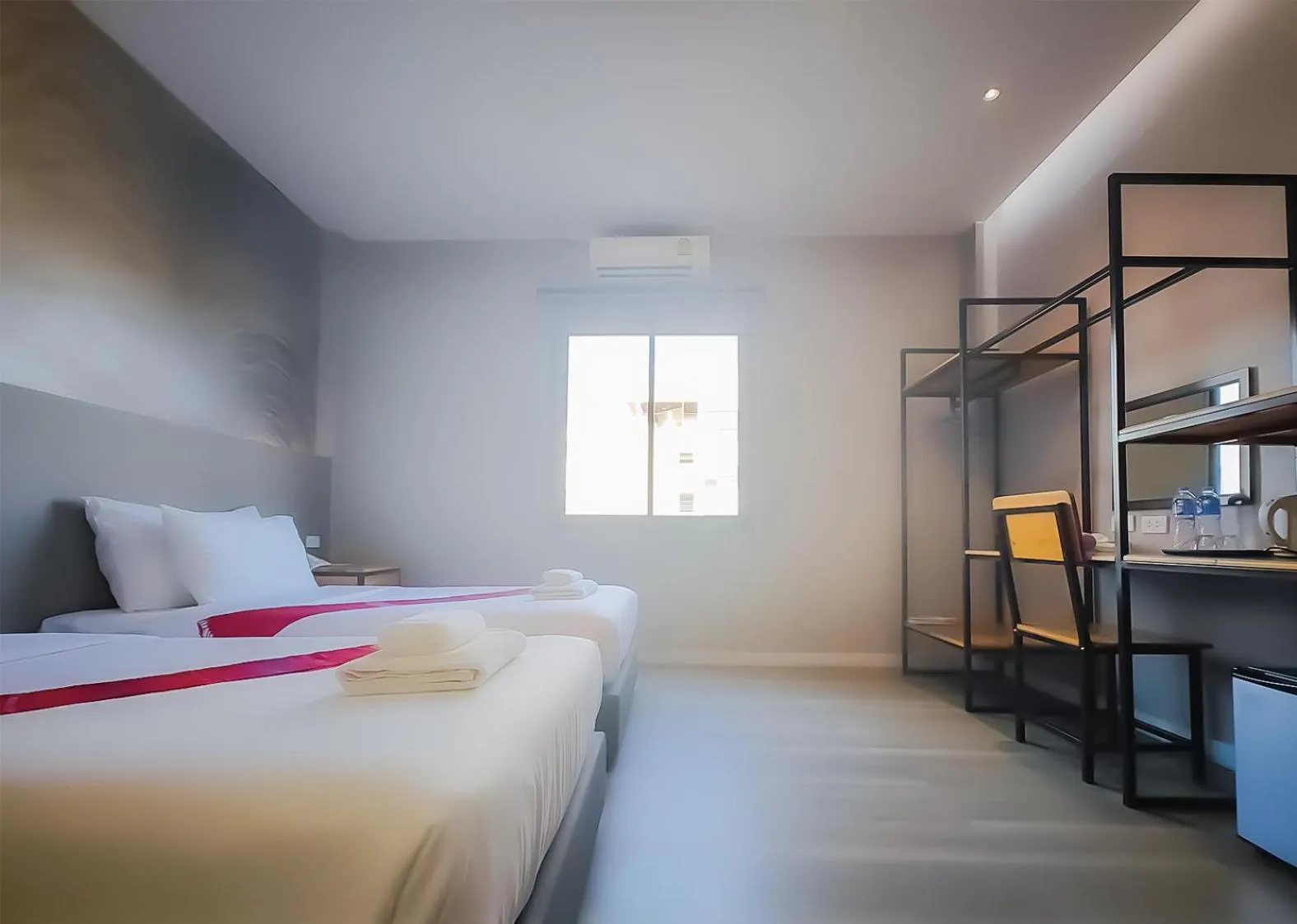 Bed in The Riva Vientiane Hotel