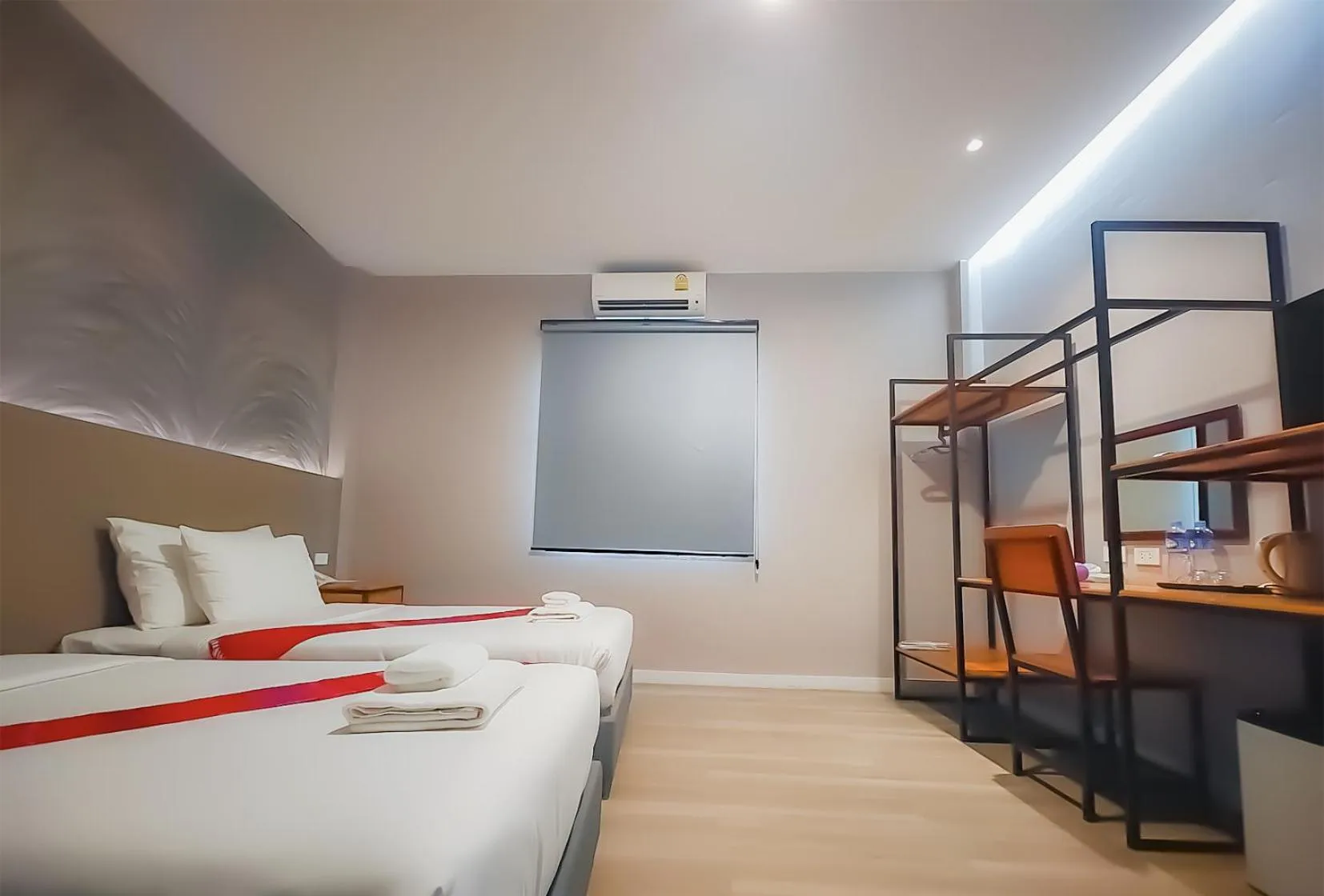 Bed in The Riva Vientiane Hotel