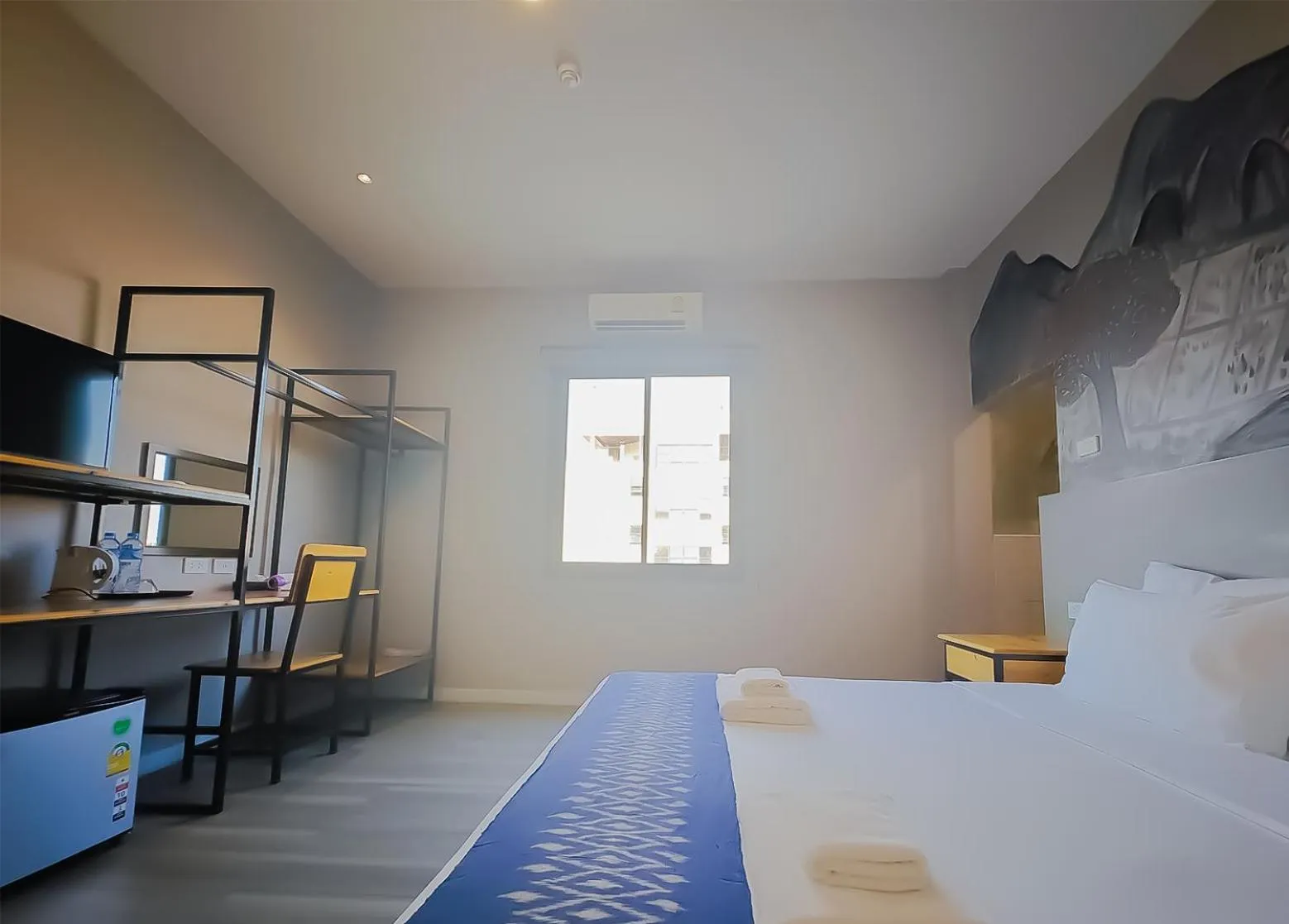 Bed in The Riva Vientiane Hotel