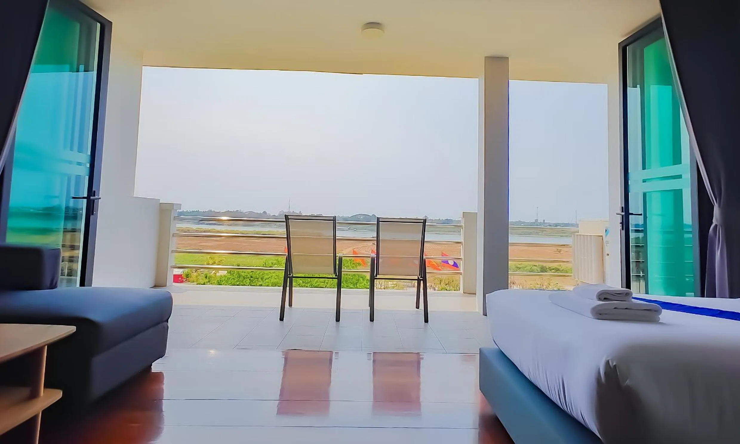 Bed in The Riva Vientiane Hotel