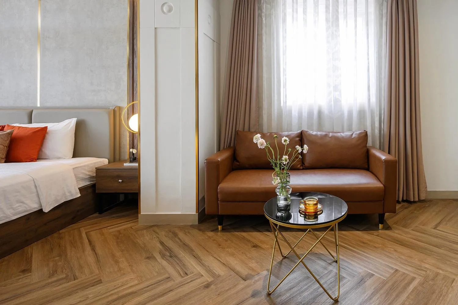 Seating area, Bed in Acnos Hotel