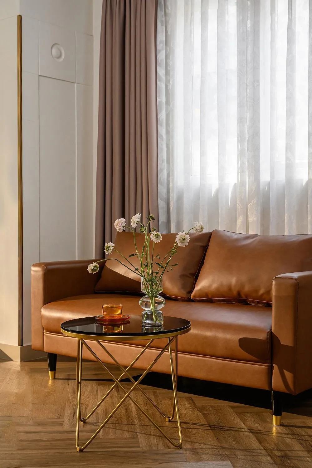 Seating area in Acnos Hotel