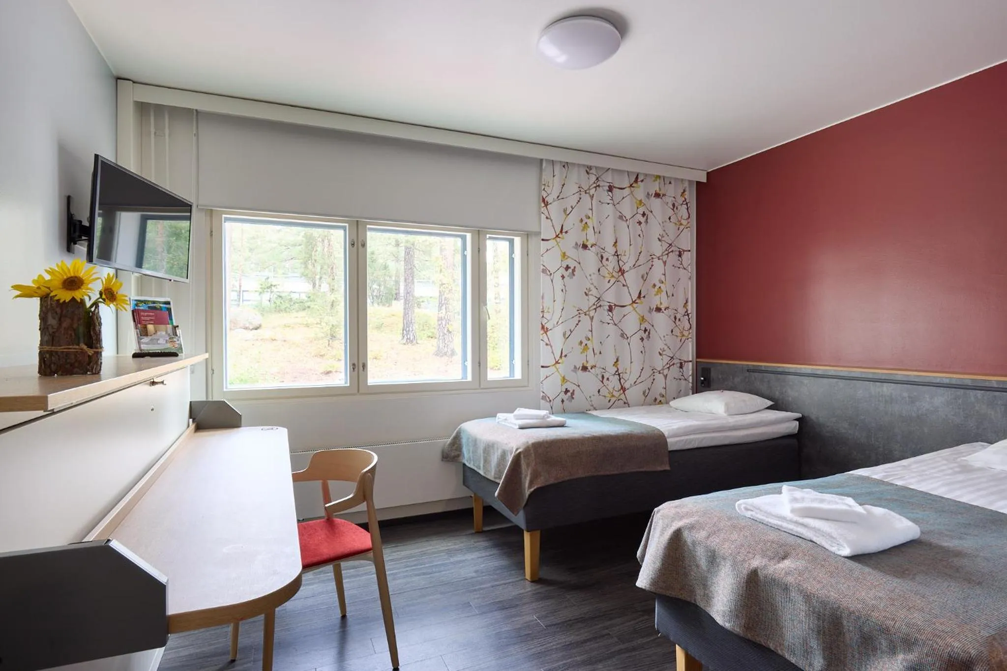 Bed in Hotel Linnasmäki