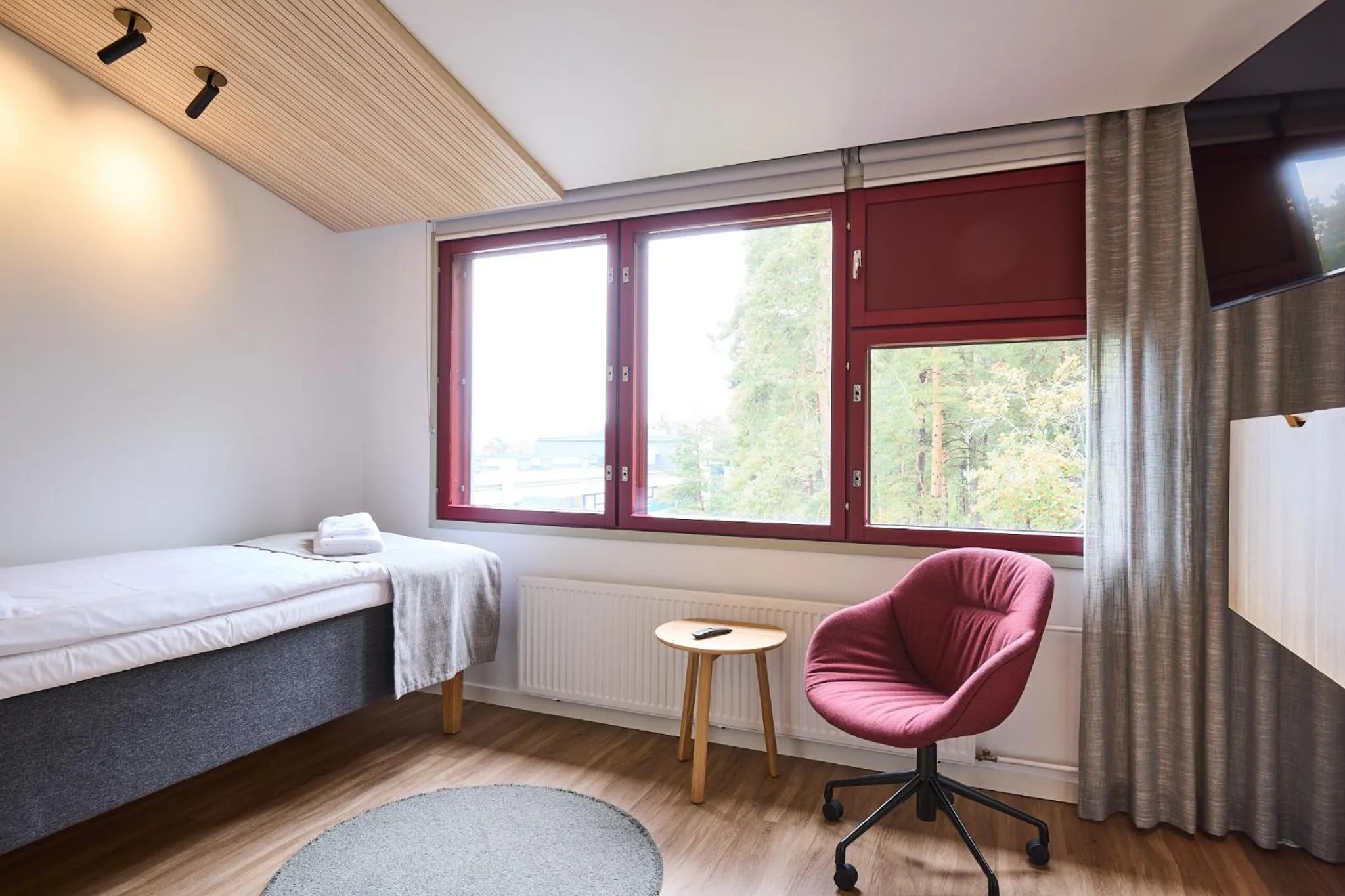 Bed in Hotel Linnasmäki