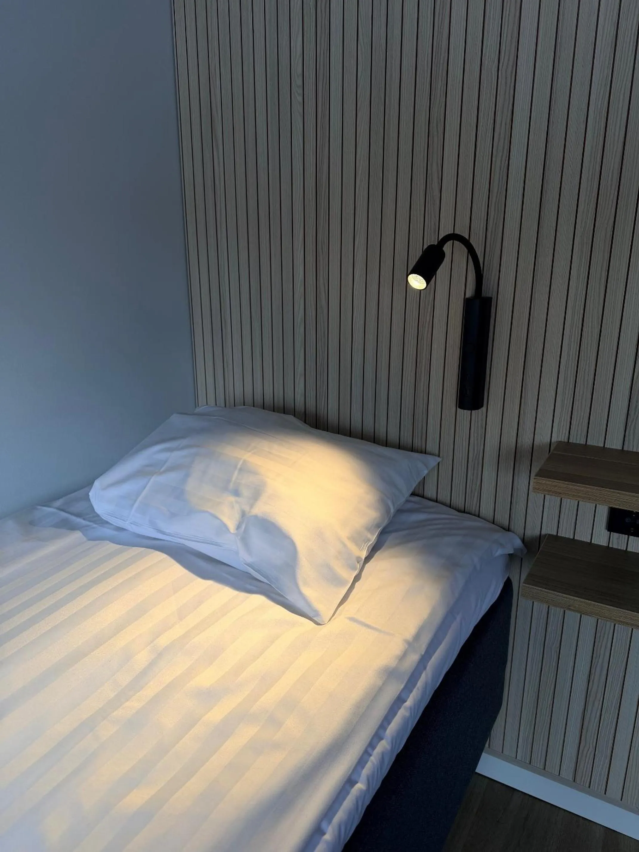 Bed in Hotel Linnasmäki