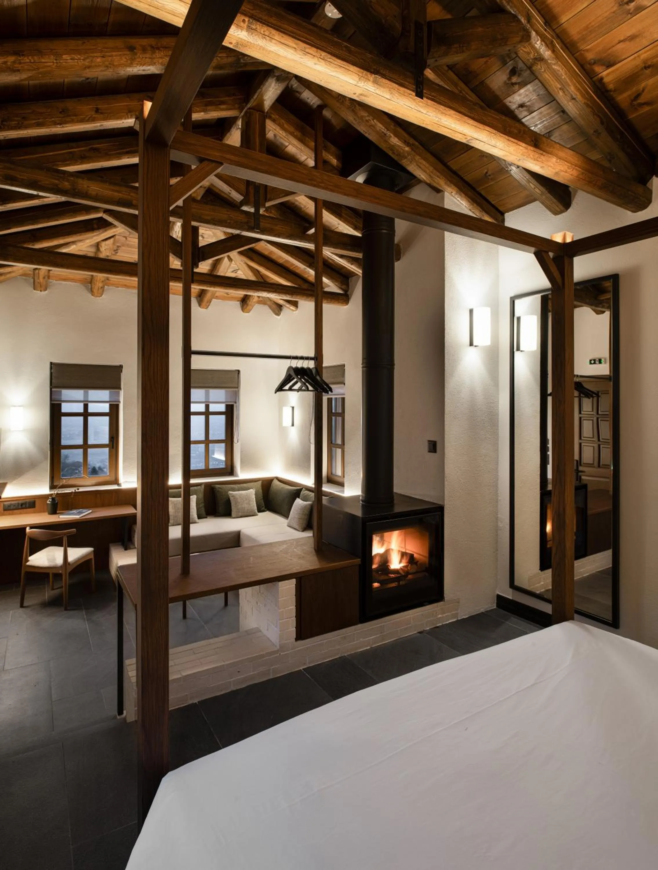 Seating area, Bed in Unedo All Seasons Boutique Hotel