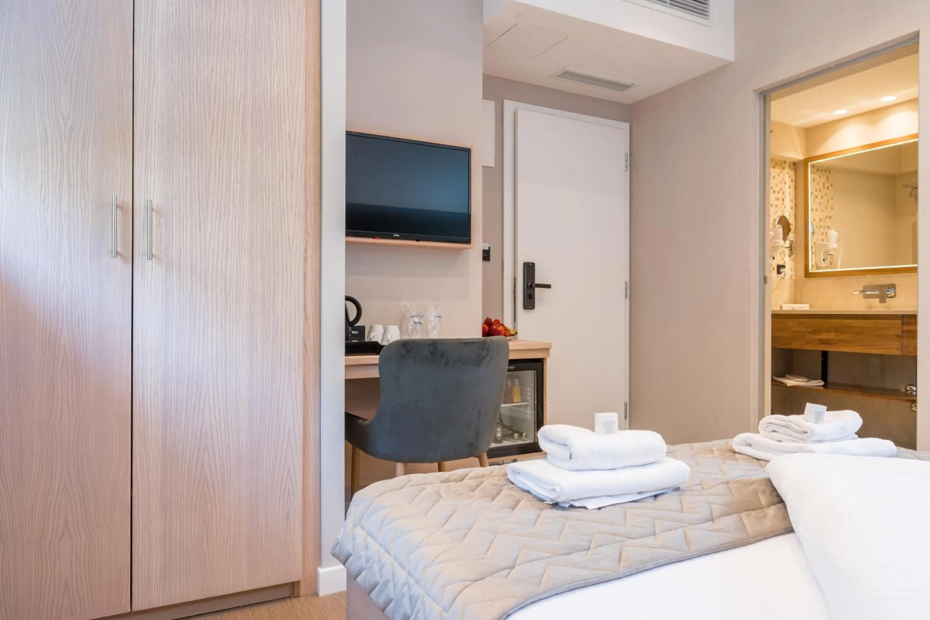 Bed in Emilia Lux Rooms