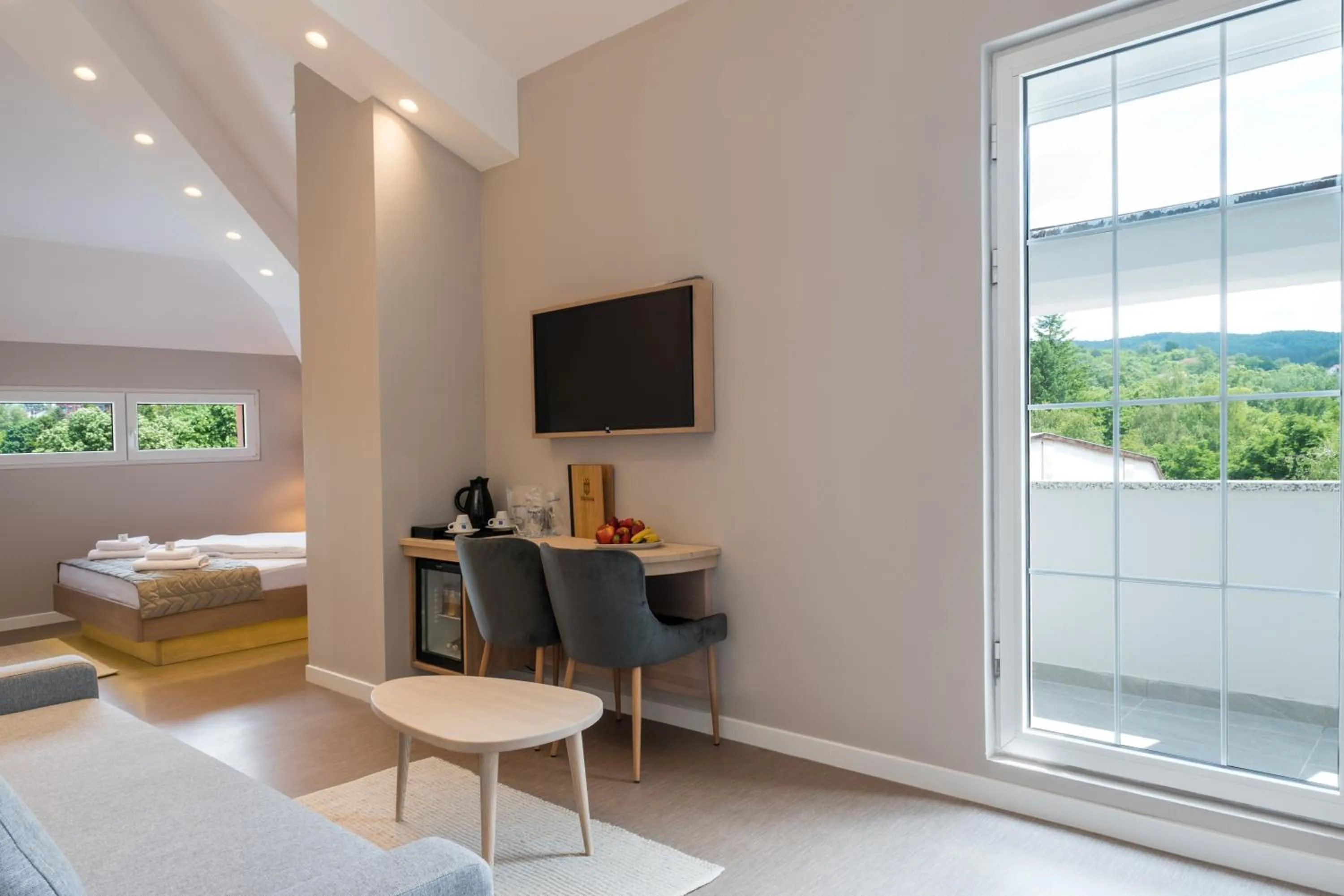 Bed in Emilia Lux Rooms