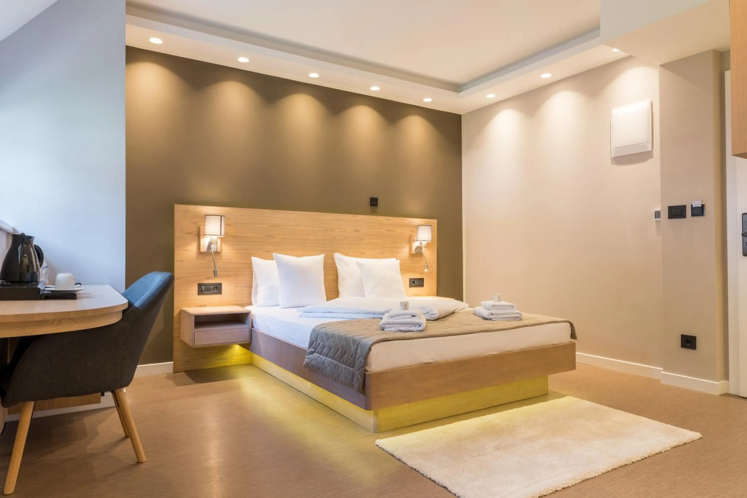 Bed in Emilia Lux Rooms