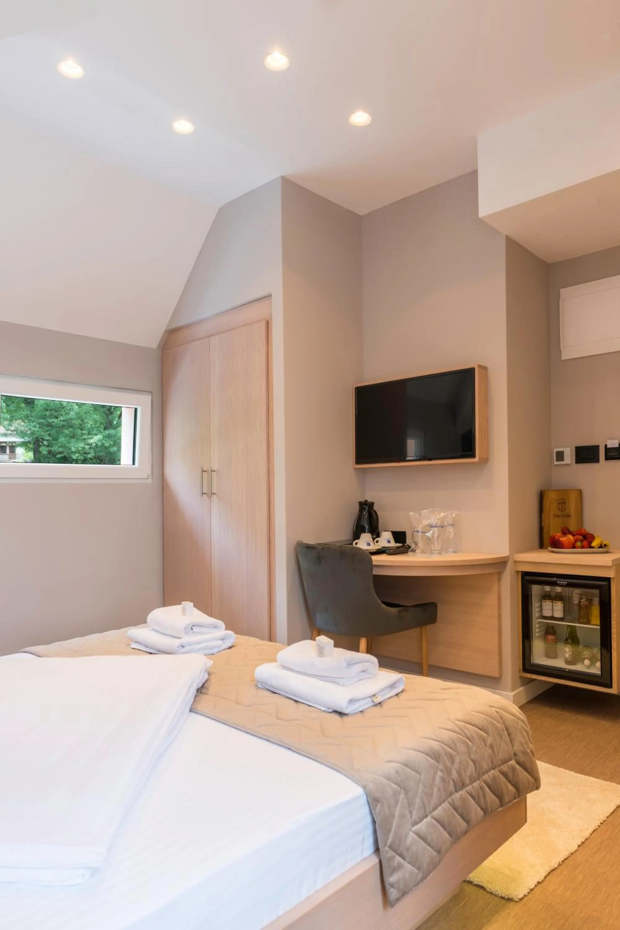 Bed in Emilia Lux Rooms