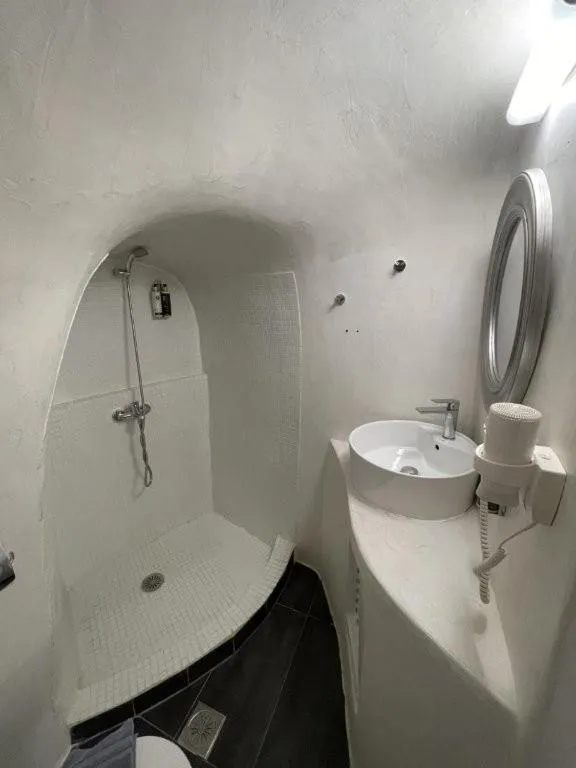 Bathroom in Vogue Suites